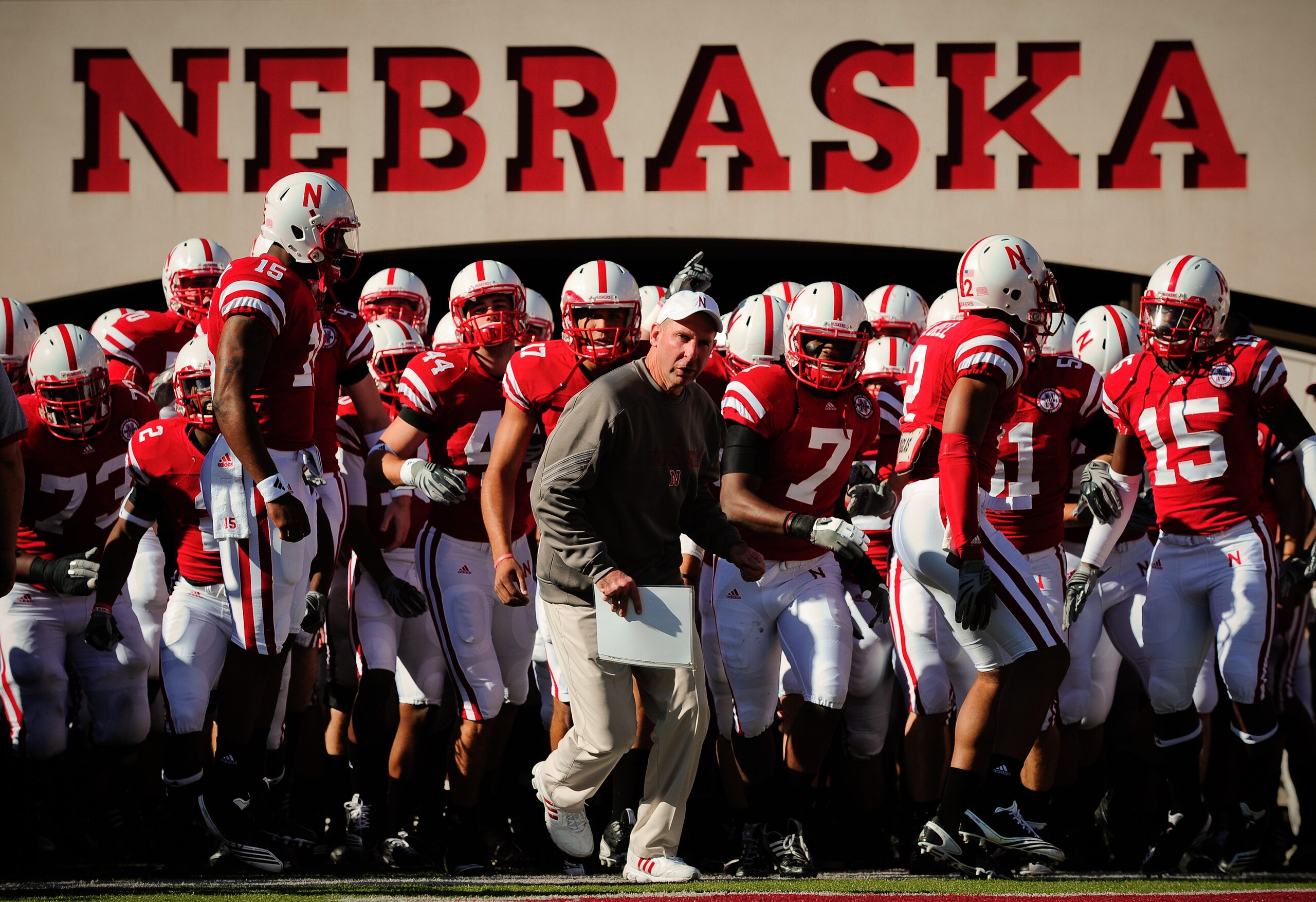 LINCOLN, NE - OCTOBER 30: Coach Bo Pelini leads his Nebraska Cornhusker football team on the field against the Missouri Tigers at Memorial Stadium on October 30, 2010 in Lincoln, Nebraska. Nebraska Defeated Missouri 31-17. (Photo by Eric Francis/Getty Im LINCOLN, NE - OCTOBER 30: Coach Bo Pelini leads his Nebraska Cornhusker football team on the field against the Missouri Tigers at Memorial Stadium on October 30, 2010 in Lincoln, Nebraska. Nebraska Defeated Missouri 31-17. (Photo by Eric Francis/Getty Im