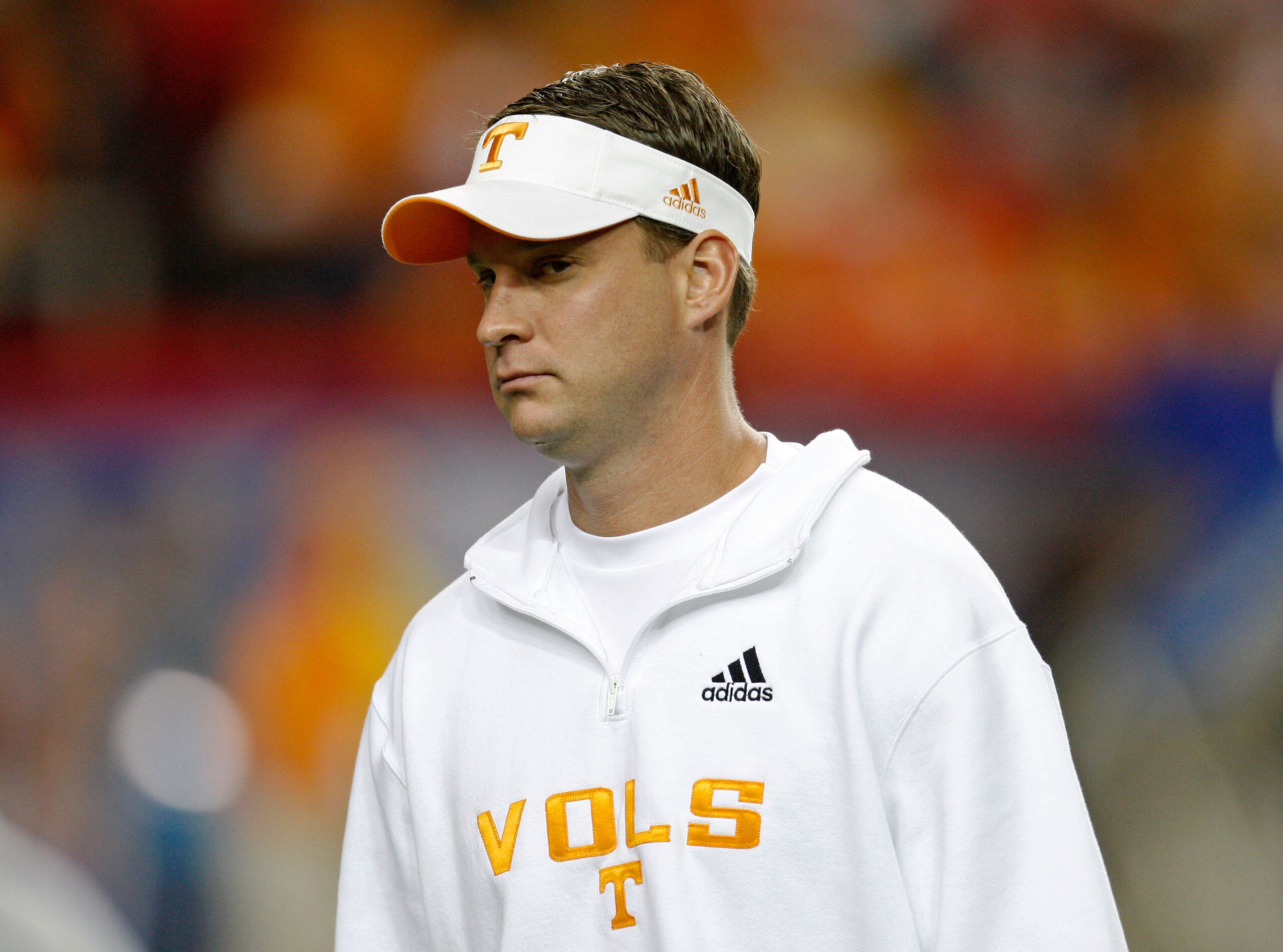 ATLANTA - DECEMBER 31:  Coach Lane Kiffin of the Tennessee Volunteers watches pre-game warmups before the Chick-Fil-A Bowl against the Virginia Tech Hokies at the Georgia Dome on December 31, 2009 in Atlanta, Georgia.  The Hokies beat the Volunteers 37-14