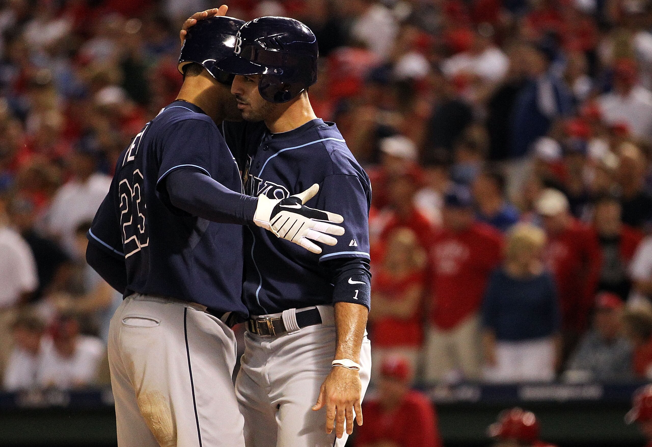 ARLINGTON, TX - OCTOBER 09:  (L-R) Carlos Pena #23 of the Tampa Bay Rays celebrates a two run homerun with Sean Rodriguez #1 in the 9th inning against the Texas Rangers during game 3 of the ALDS at Rangers Ballpark in Arlington on October 9, 2010 in Arlin