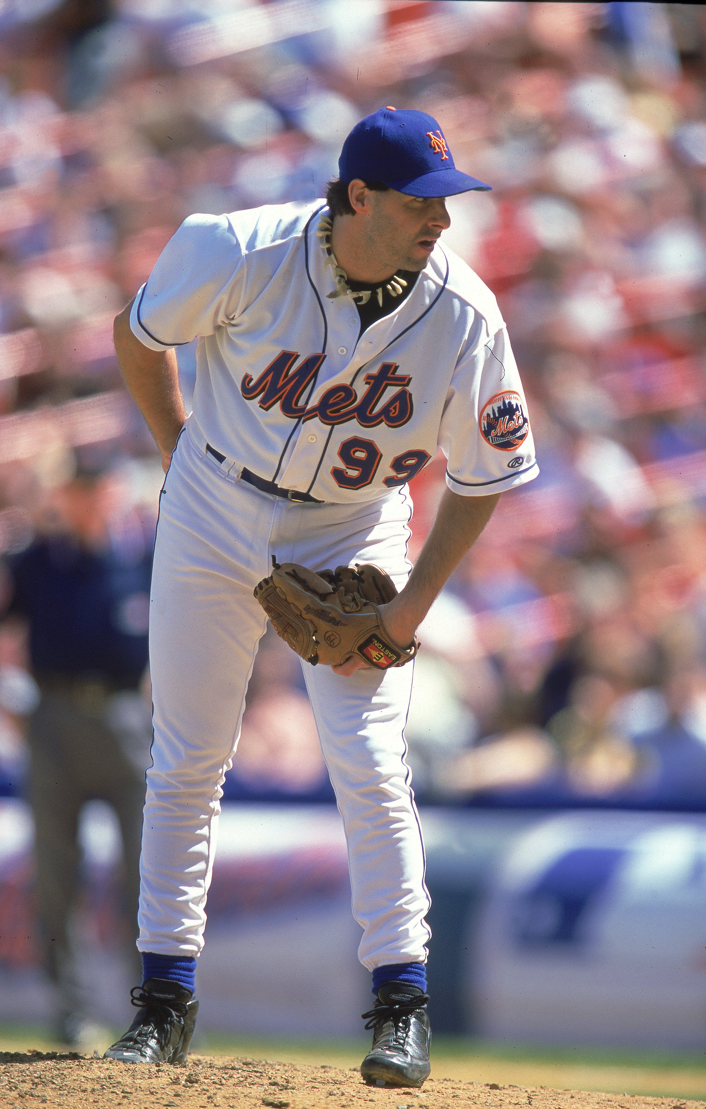 17 Aug 2000:  Pitcher Turk Wendell #99 of the New York Mets looks for the sign during the game against the Colorado Rockies at Shea Stadium in Flushing, New York. The Mets defeated the Rockies 2-1.Mandatory Credit: Jamie Squire  /Allsport