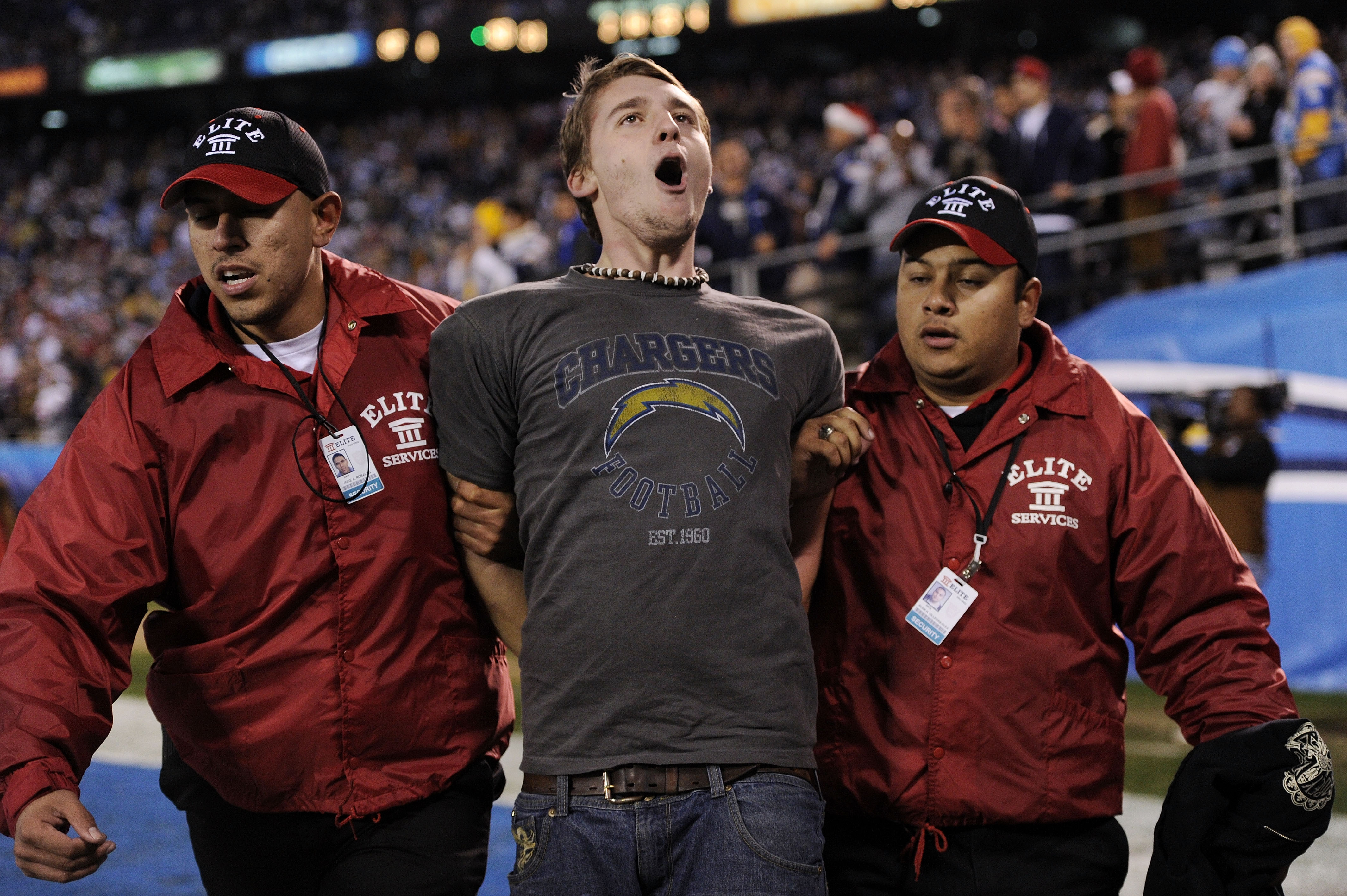 Two Green Bay Packers fans wear different style cheese head hats during the  first half of the Packers-Arizona Cardinals game at University of Phoenix  Stadium in Glendale, Arizona, December 27, 2015. Photo