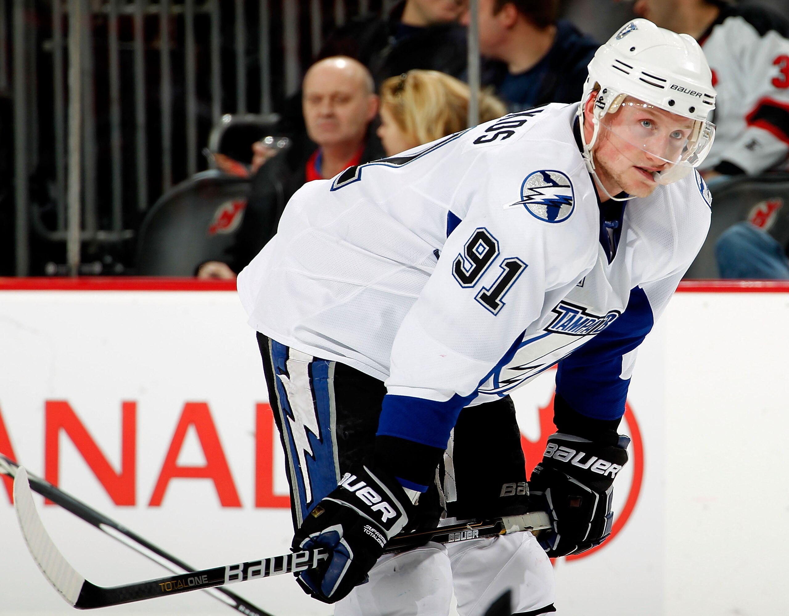 NEWARK, NJ - JANUARY 09:  Steven Stamkos #91 of the Tampa Bay Lightning waits for a faceoff during an NHL hockey game against the New Jersey Devils at the Prudential Center on January 9, 2011 in Newark, New Jersey.  (Photo by Paul Bereswill/Getty Images)