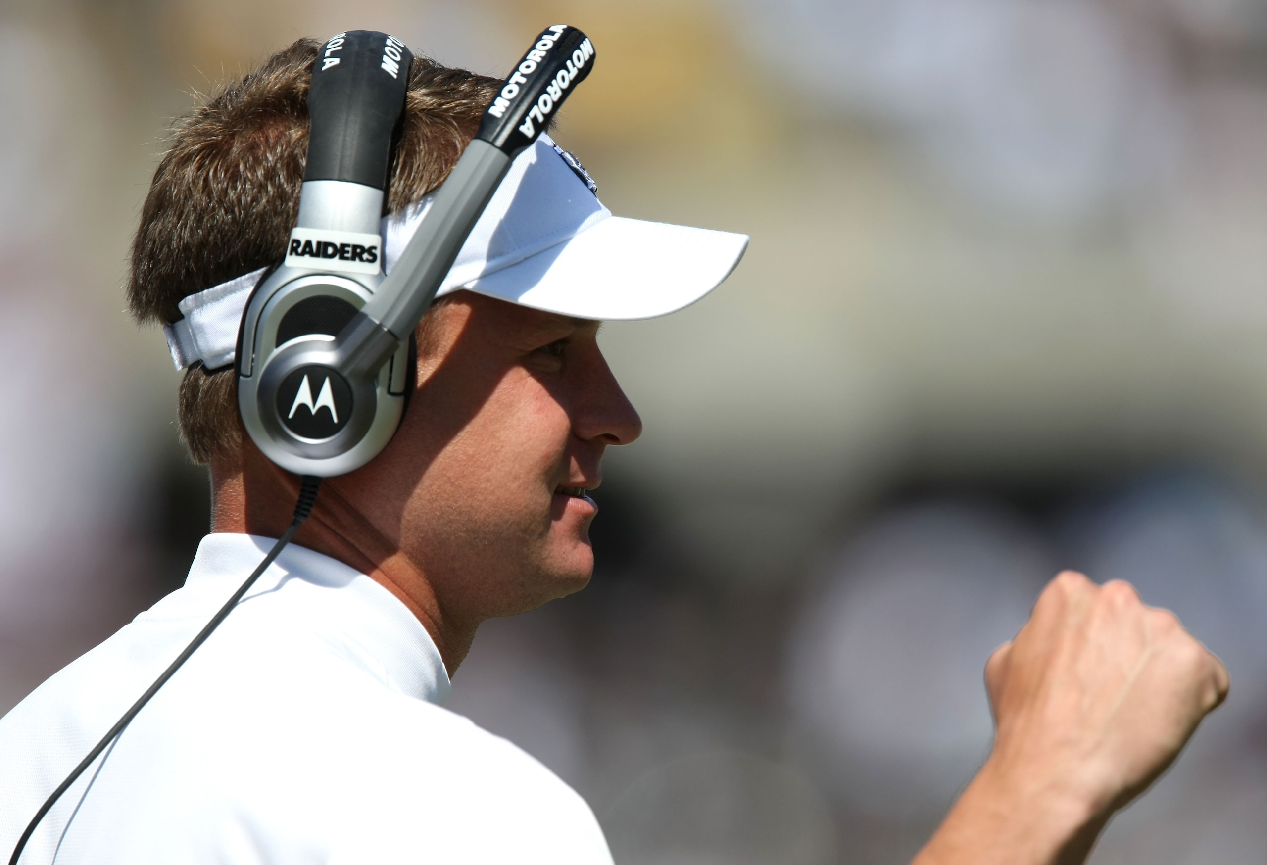 OAKLAND, CA - SEPTEMBER 28: Head coach Lane Kiffin of the Oakland Raiders pumps his fist against the San Diego Chargers during an NFL game on September 28, 2008 at McAfee Coliseum in Oakland, California.  (Photo by Jed Jacobsohn/Getty Images)