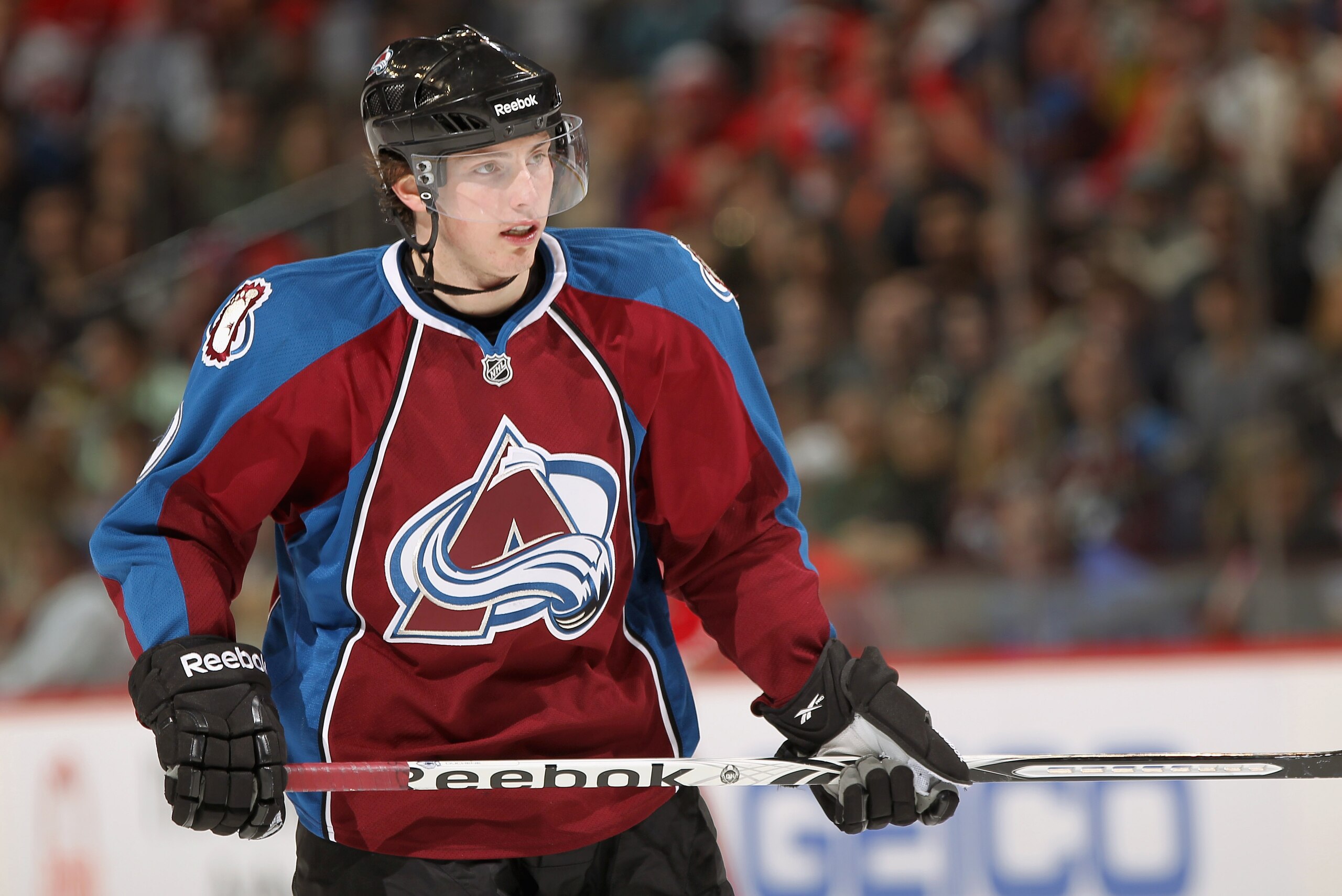 DENVER, CO - JANUARY 10:  Matt Duchene #9 of the Colorado Avalanche looks on during a break in the action against the Detroit Red Wings at the Pepsi Center on January 10, 2011 in Denver, Colorado. Duchene earned the number one star as he scored two goals
