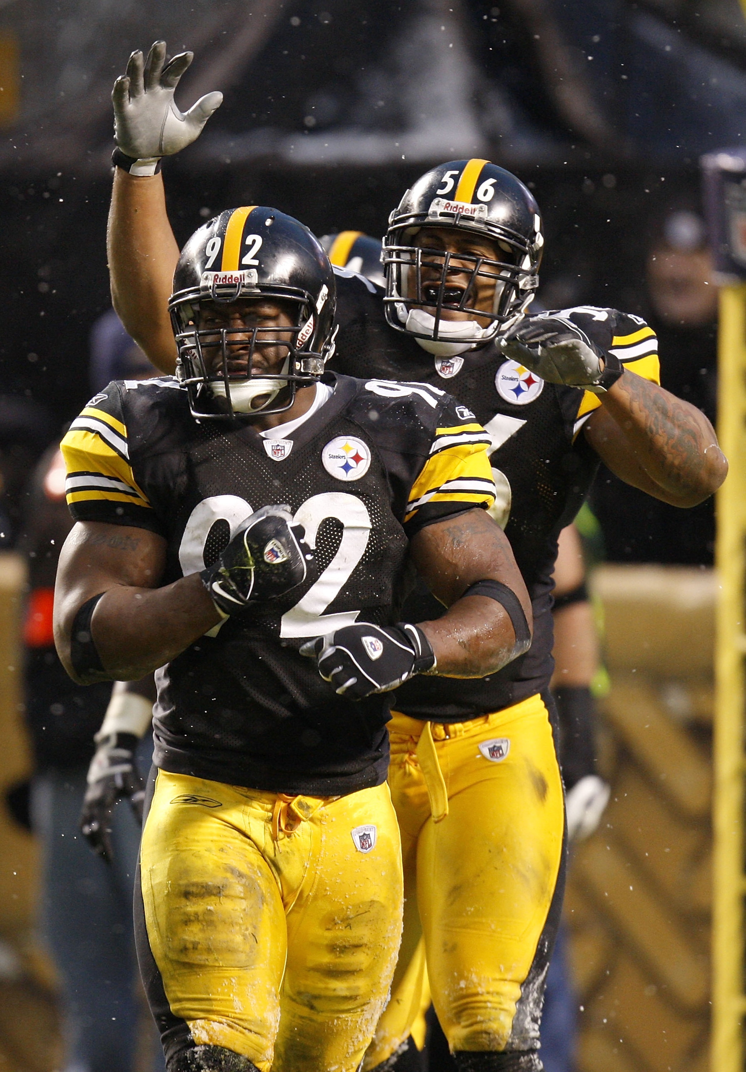 PITTSBURGH - NOVEMBER 16:  James Harrison #92 of the Pittsburgh Steelers is congratulated by LaMarr Woodley #56 after a second quarter saftey while playing the San Diego Chargers on November 16, 2008 at Heinz Field in Pittsburgh, Pennsylvania.  (Photo by