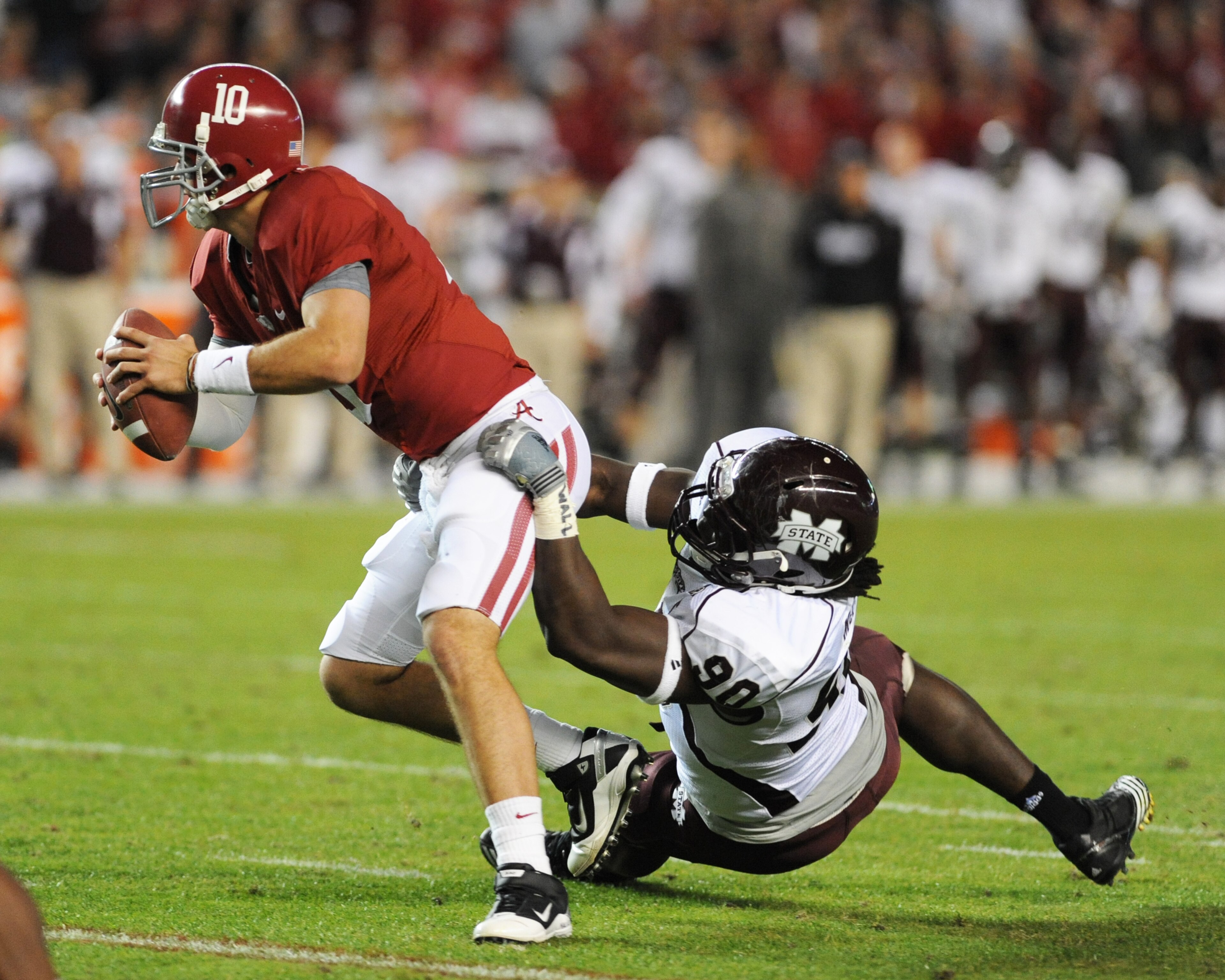 TUSCALOOSA, AL - NOVEMBER 13: Defensive lineman Pernell McPhee #90 of the Mississippi State Bulldogs sacks quarterback A. J. McCarron #10 of the Alabama Crimson Tide November 13, 2010 at Bryant-Denny Stadium in Tuscaloosa, Alabama.  (Photo by Al Messersch