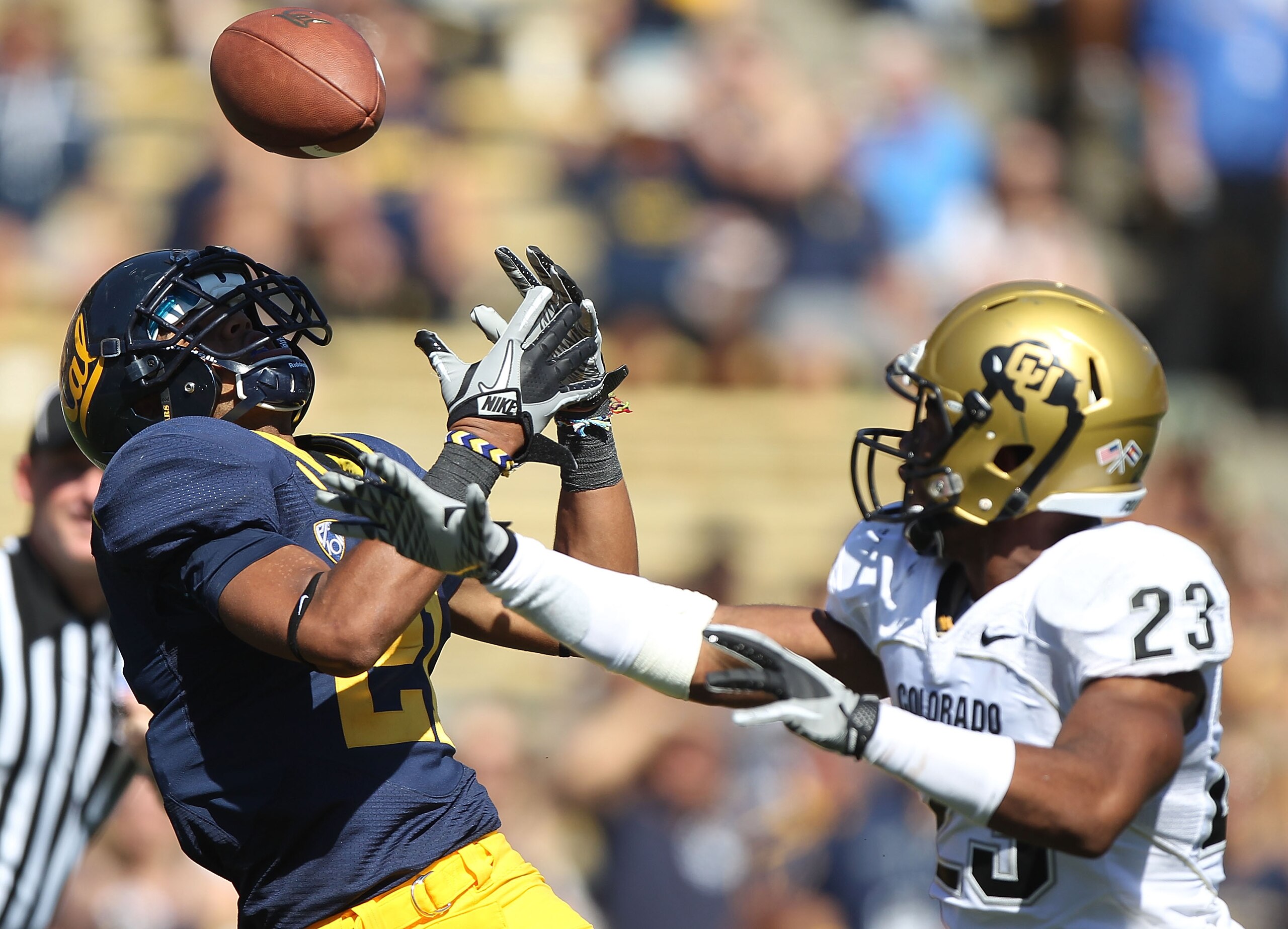 BERKELEY, CA - SEPTEMBER 11:  Keenan Allen #21 of the California Golden Bears can't catch a pass as Jalil Brown #23 of the Colorado Buffaloes defends at California Memorial Stadium on September 11, 2010 in Berkeley, California.  (Photo by Jed Jacobsohn/Ge