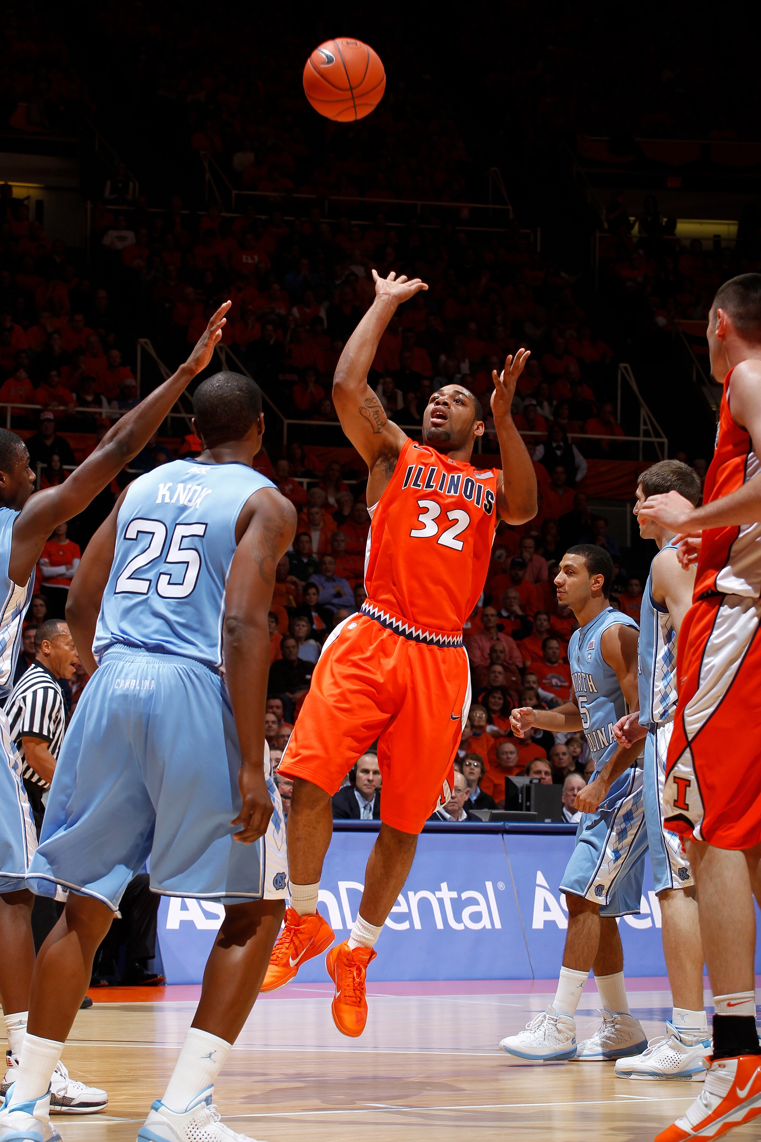 CHAMPAIGN, IL - NOVEMBER 30: Demetri McCamey #32 of the Illinois Fighting Illini puts up a shot in the lane against the North Carolina Tar Heels during the 2010 ACC/Big Ten Challenge at Assembly Hall on November 30, 2010 in Champaign, Illinois. Illinois d