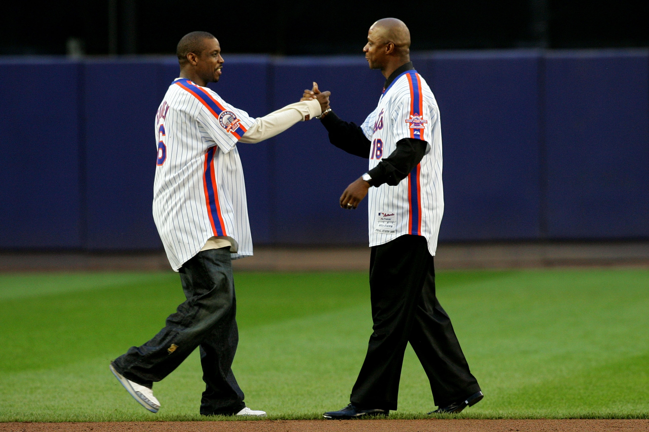 NEW YORK - SEPTEMBER 28:  Former Mets Dwight Gooden and Daryl Strawberry greet for a post game ceremony after the last regular season baseball game ever played in Shea Stadium against the Florida Marlins on September 28, 2008 in the Flushing neighborhood
