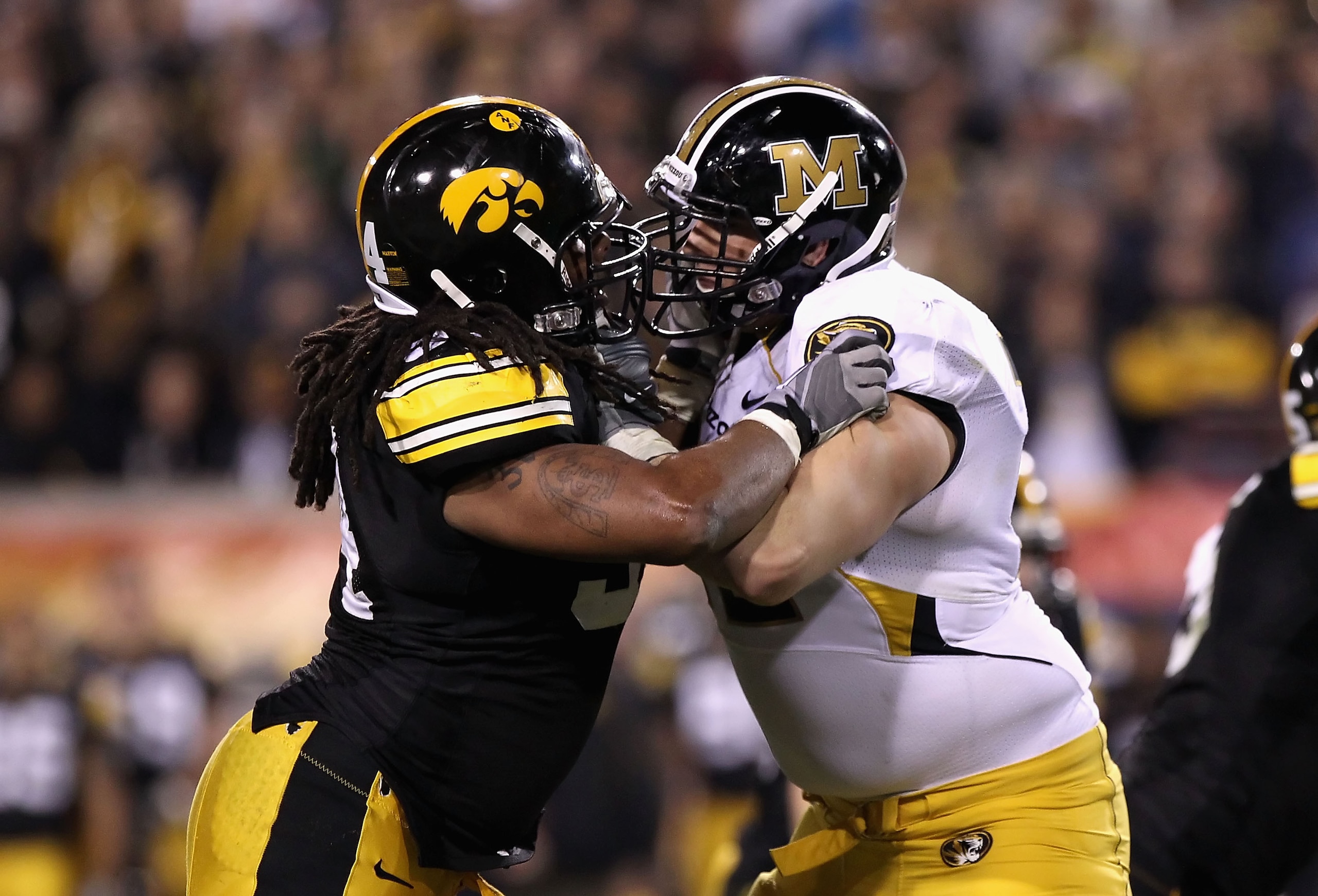 TEMPE, AZ - DECEMBER 28:  Defensive end Adrian Clayborn #94 of the Iowa Hawkeyes in action during the Insight Bowl against the Missouri Tigers at Sun Devil Stadium on December 28, 2010 in Tempe, Arizona. The Hawkeyes defeated the Tigers 27-24.  (Photo by 