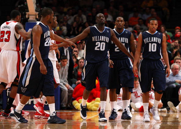 NEW YORK - MARCH 13: Dwayne Anderson #22, Shane Clark #20, Corey Stokes #24 and Corey Fisher #10 of the Villanova Wildcats react between plays against the Louisville Cardinals during the semifinal round of the Big East Tournament at Madison Square Garden