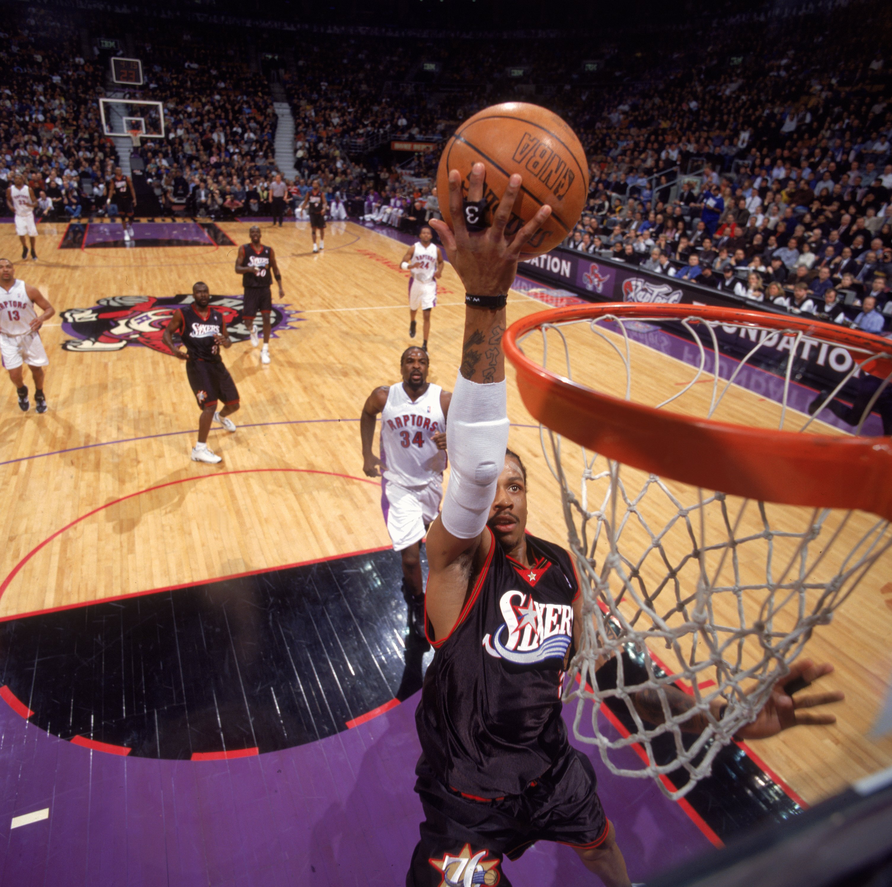 29 Jan 2001:  Allen Iverson #5 of Philadelphia 76ers jumps up to dunk the ball during the game against the Toronto Raptors at the Air Canada Centre in Toronto, Canada. The Raptors defeated the 76ers 96-89.  NOTE TO USER: It is expressly understood that th