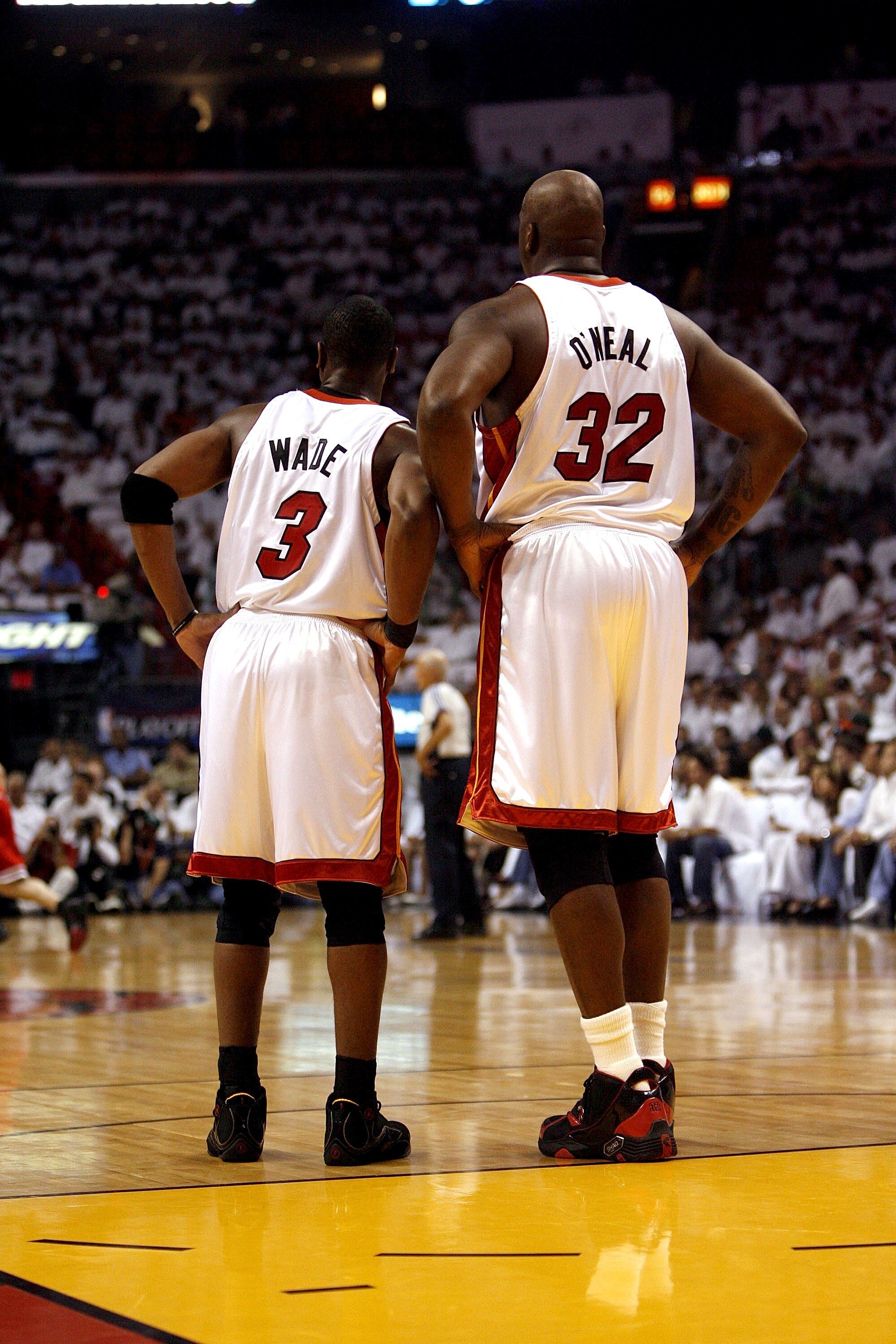 MIAMI - APRIL 27: Dwyane Wade #3 and teammate Shaquille O'Neal #32 of the Miami Heat stand together during a timeout against the Chicago Bulls in Game Three of the Eastern Conference Quarterfinals during the 2007 NBA Playoffs at American Airlines Arena on
