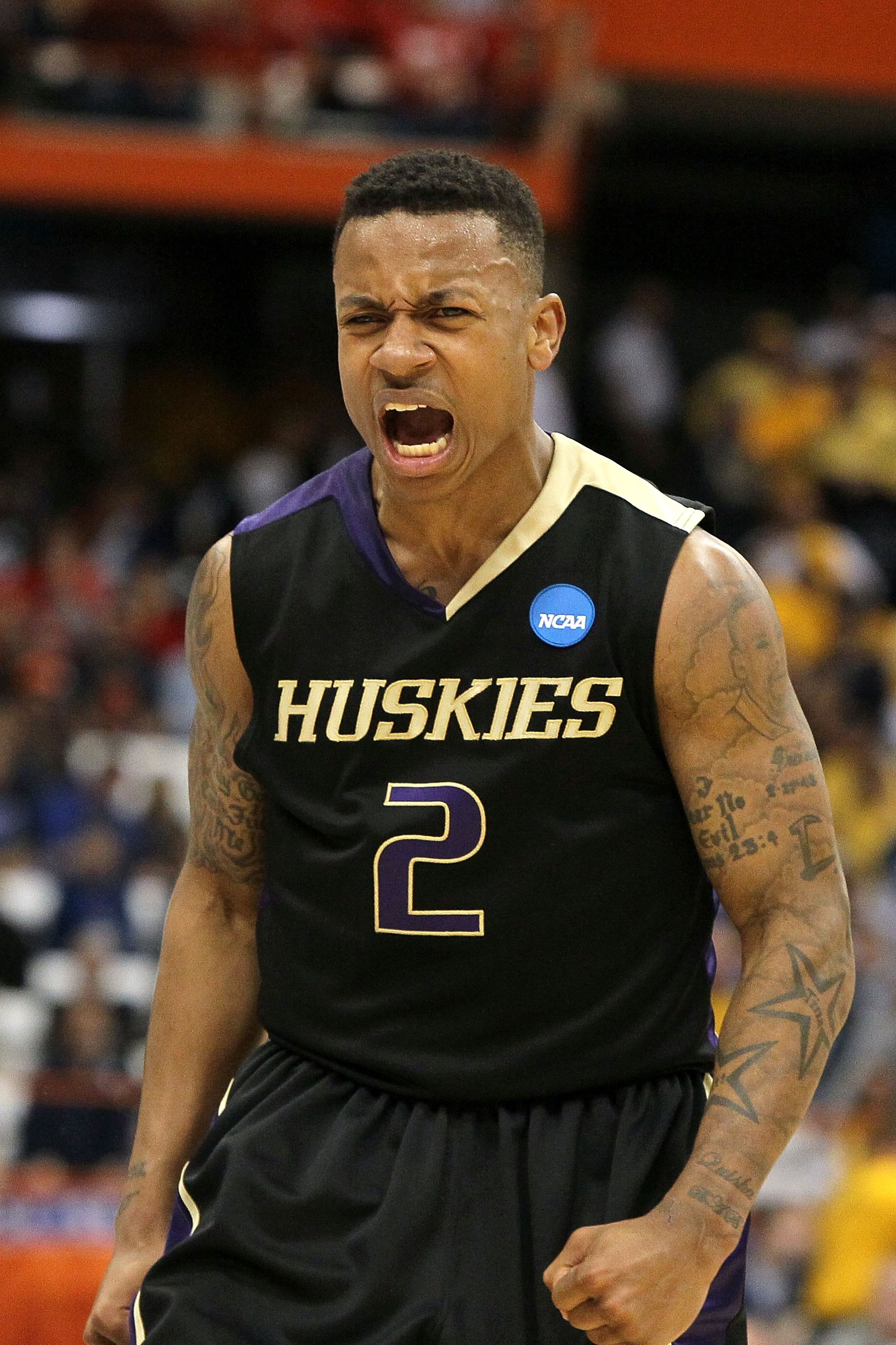 SYRACUSE, NY - MARCH 25: Isaiah Thomas #2 of the Washington Huskies reacts against the West Virginia Mountaineers during the east regional semifinal of the 2010 NCAA men's basketball tournament at the Carrier Dome on March 25, 2010 in Syracuse, New York.