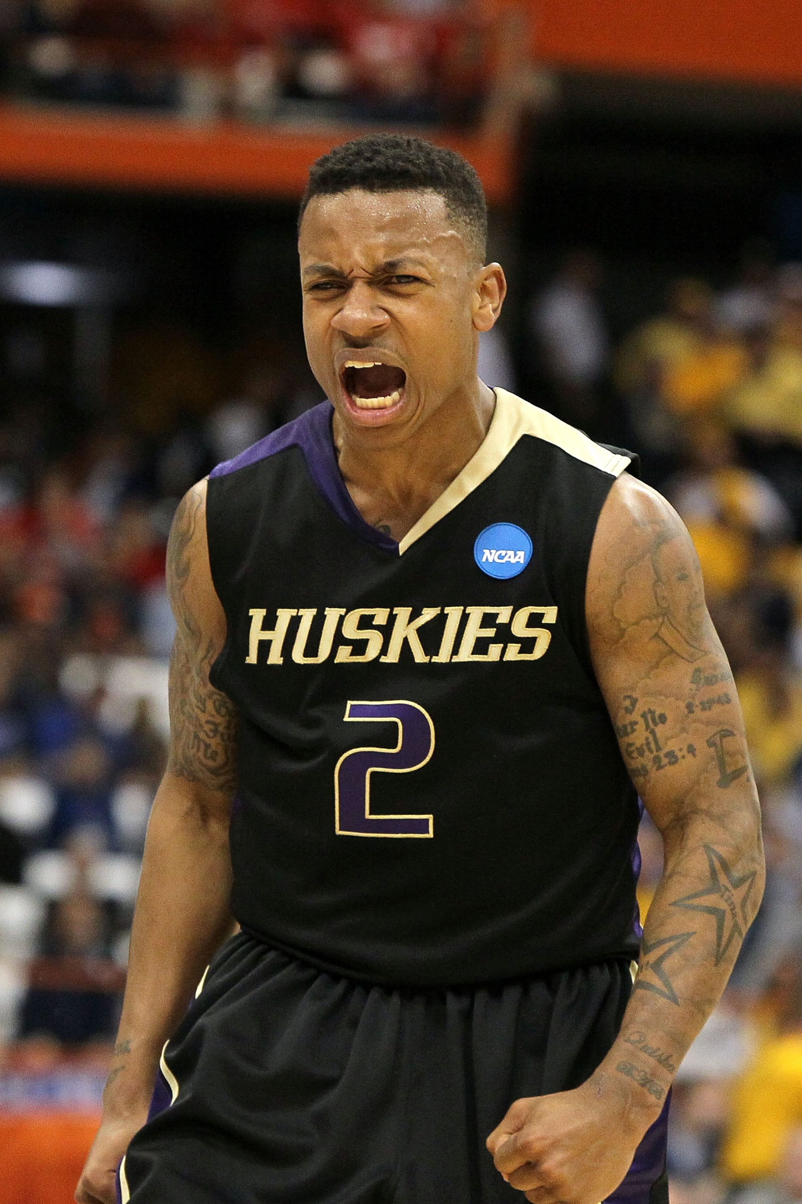 SYRACUSE, NY - MARCH 25:  Isaiah Thomas #2 of the Washington Huskies reacts against the West Virginia Mountaineers during the east regional semifinal of the 2010 NCAA men's basketball tournament at the Carrier Dome on March 25, 2010 in Syracuse, New York.