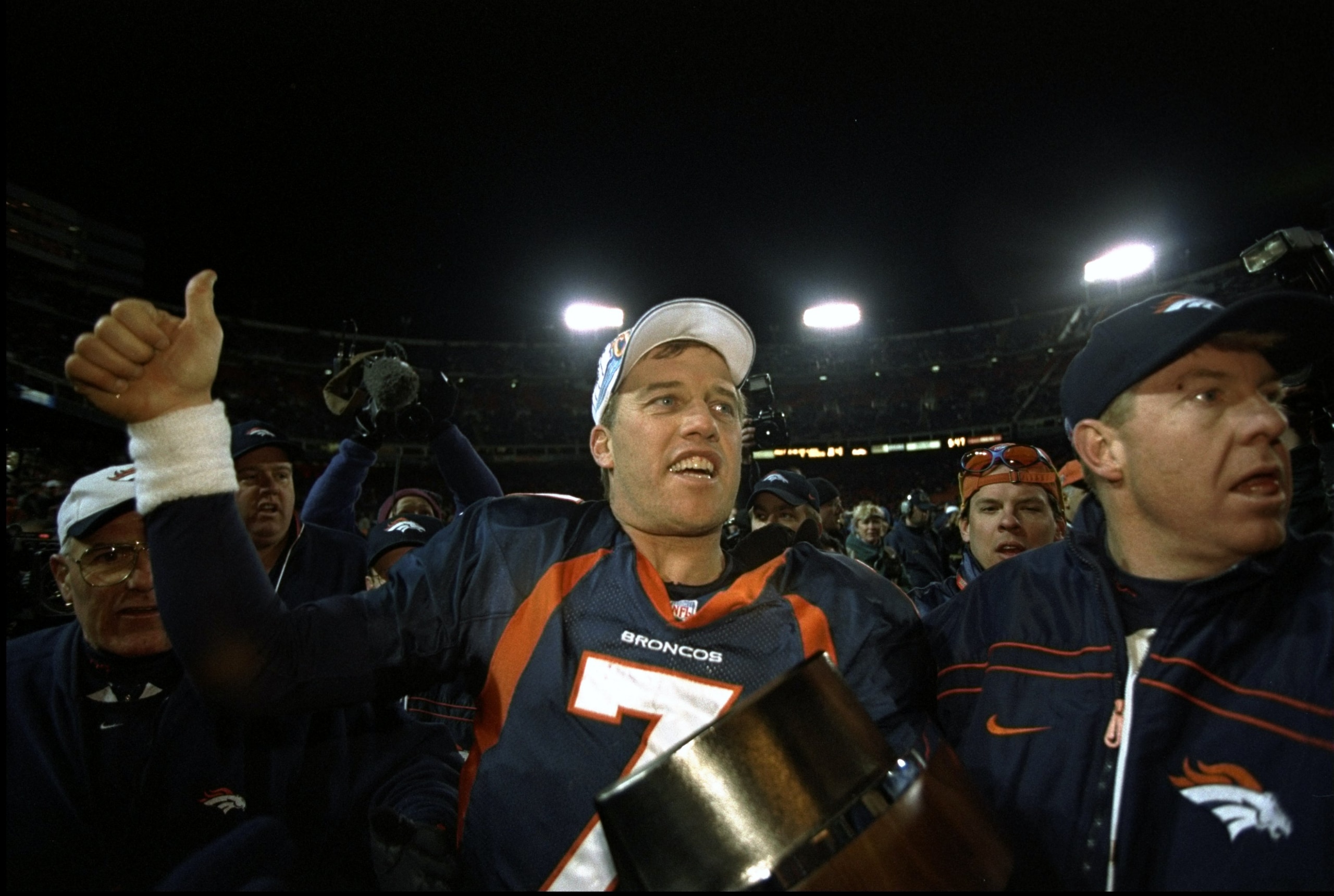 17 Jan 1999:  John Elway #7 of the Denver Broncos gives a thumbs up after winning the AFC Championship Game against the New York Jets at Mile High Stadium in Denver, Colorado. The Broncos defeated the Jets 23-10. Mandatory Credit: Vincent Laforet  /Allspo