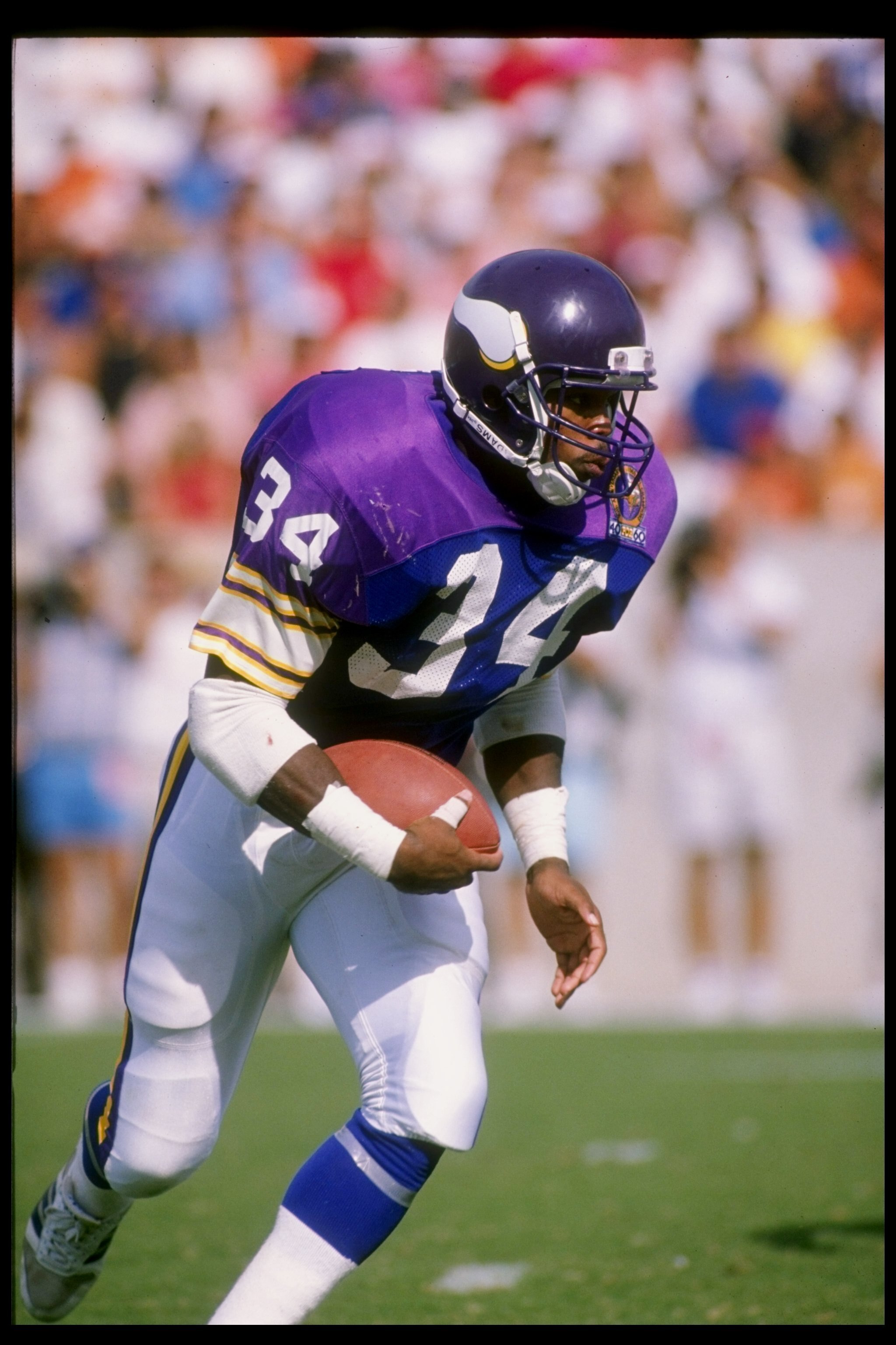 12 Nov 1989:  Running back Herschel Walker of the Minnesota Vikings runs with the ball during a game against the Tampa Bay Buccaneers at Tampa Stadium in Tampa, Florida.  The Vikings won the game 24-10. Mandatory Credit: Scott Halleran  /Allsport