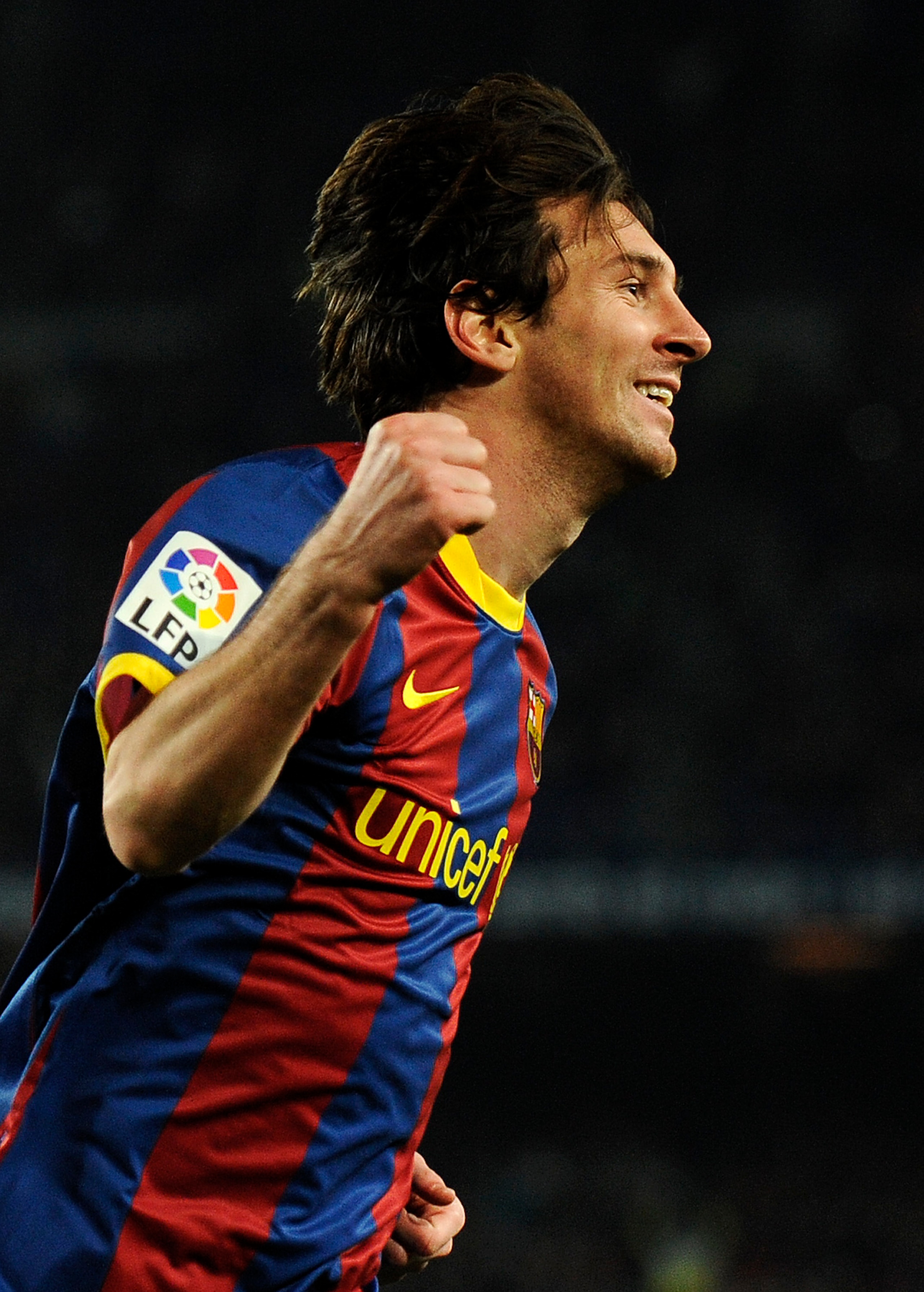 BARCELONA, SPAIN - JANUARY 12: Lionel Messi of FC Barcelona (R) celebrates after scoring his side's second goal during the Copa del Rey quarter final first leg match FC Barcelona and Betis at Camp Nou on January 12, 2011 in Barcelona, Spain. Barcelona wo BARCELONA, SPAIN - JANUARY 12: Lionel Messi of FC Barcelona (R) celebrates after scoring his side's second goal during the Copa del Rey quarter final first leg match FC Barcelona and Betis at Camp Nou on January 12, 2011 in Barcelona, Spain. Barcelona wo