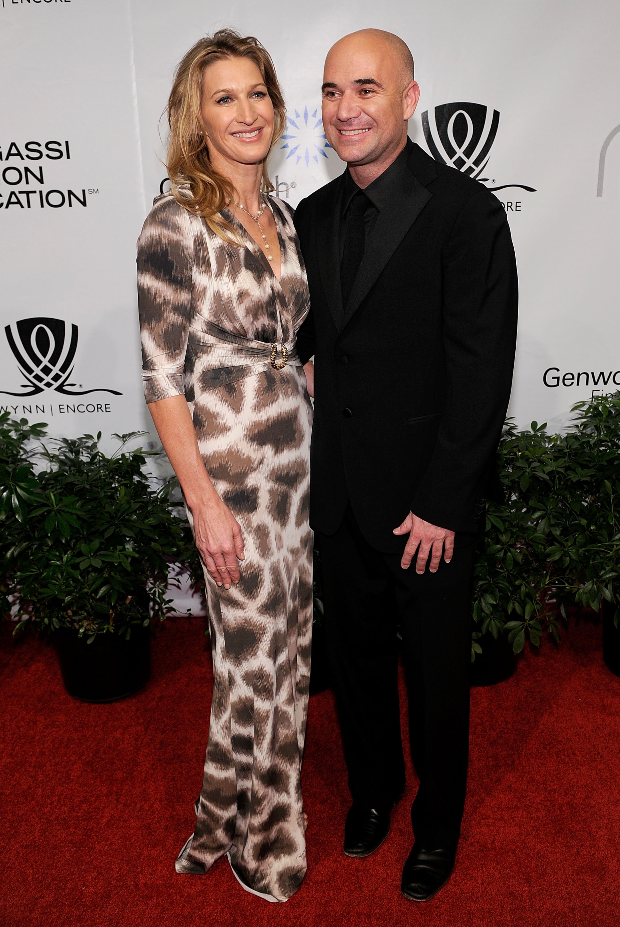 LAS VEGAS - OCTOBER 09: Former tennis players Steffi Graf (L) and Andre Agassi arrive at the Andre Agassi Foundation for Education's 15th Grand Slam for Children benefit concert at the Wynn Las Vegas October 9, 2010 in Las Vegas, Nevada. The event raises LAS VEGAS - OCTOBER 09: Former tennis players Steffi Graf (L) and Andre Agassi arrive at the Andre Agassi Foundation for Education's 15th Grand Slam for Children benefit concert at the Wynn Las Vegas October 9, 2010 in Las Vegas, Nevada. The event raises