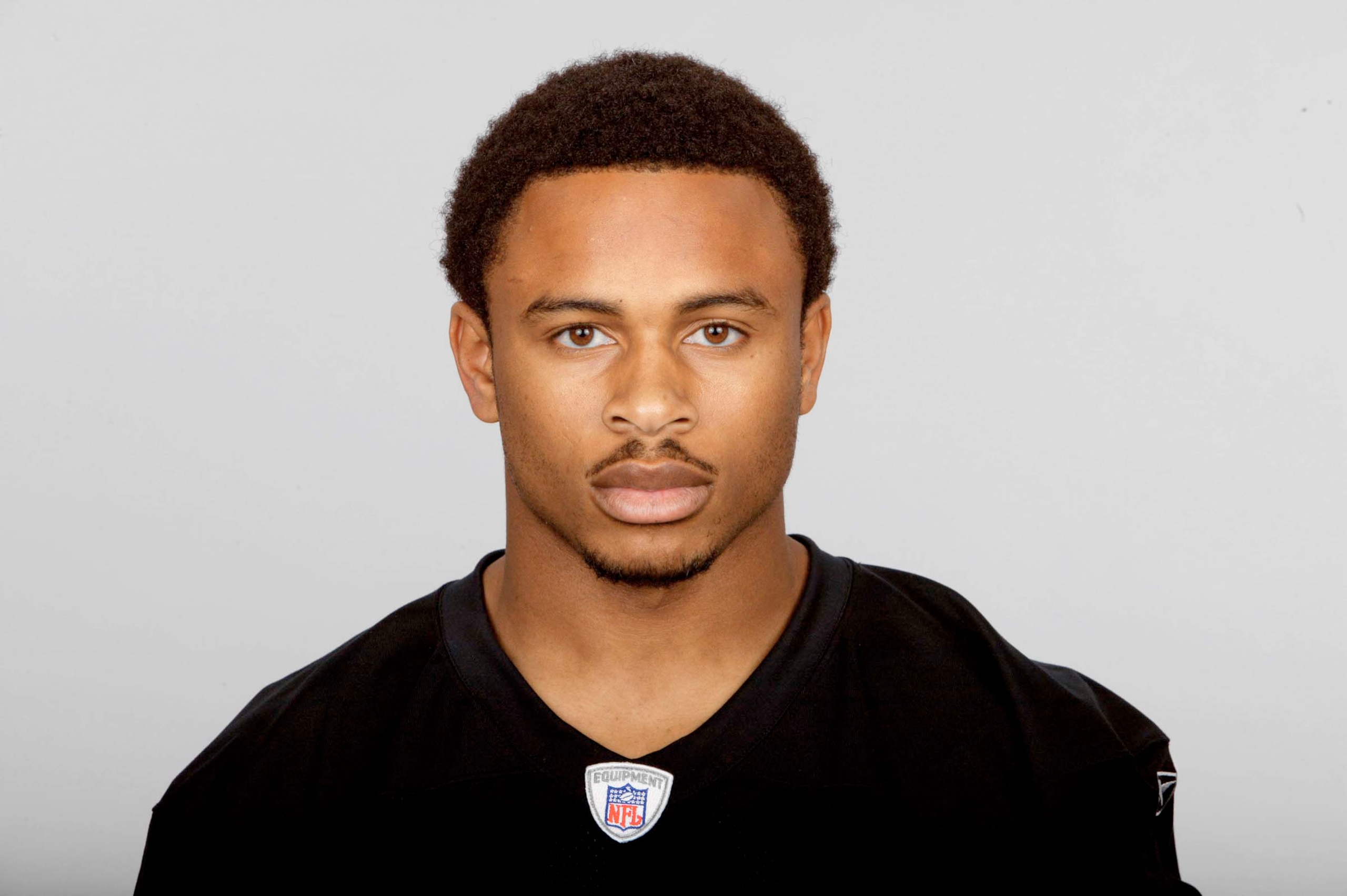 OAKLAND, CA - 2006:  Nnamdi Asomugha #21 of the Oakland Raiders poses for his 2006 NFL headshot at photo day in Oakland, California. (Photo by Getty Images)