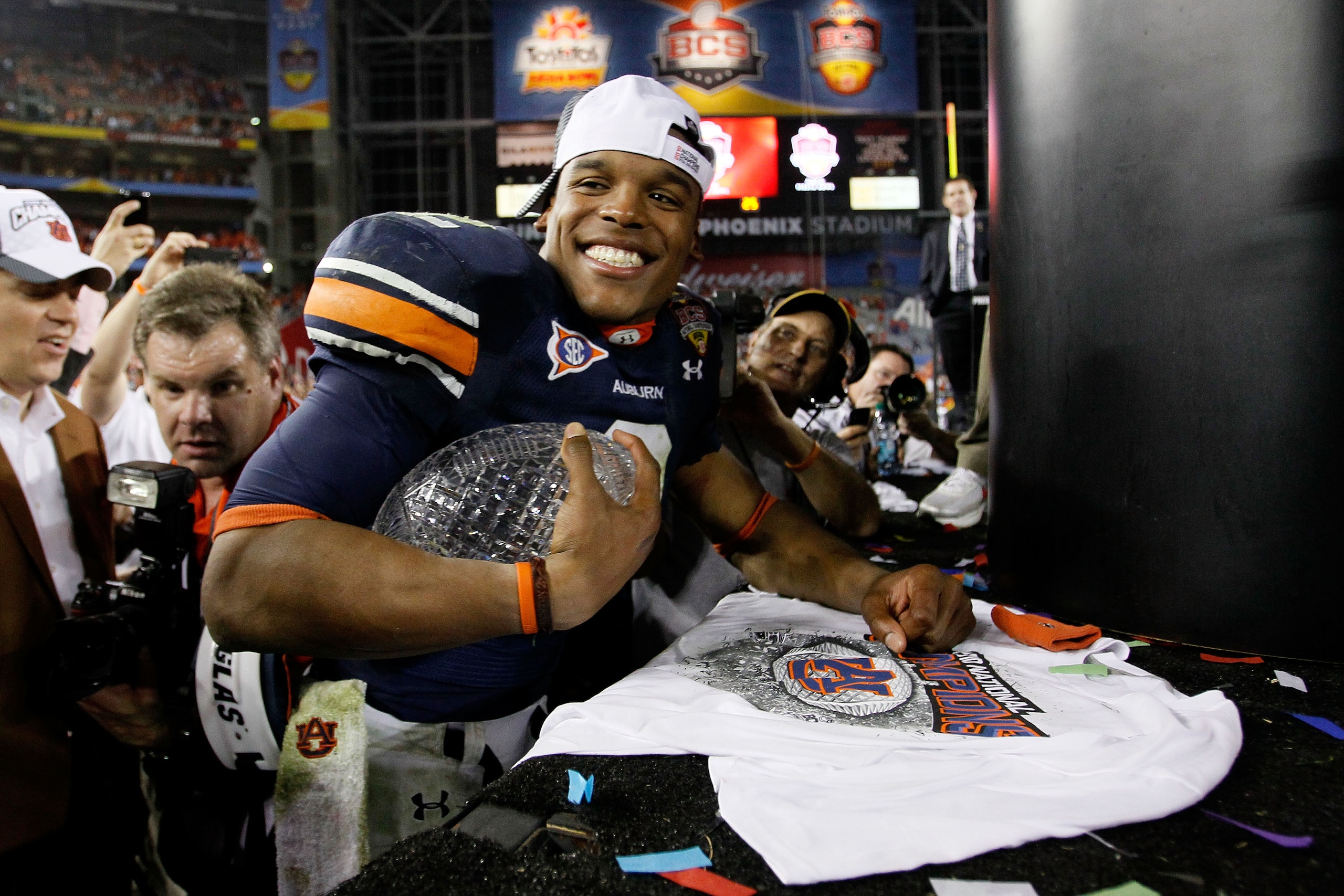 GLENDALE, AZ - JANUARY 10:  Quarterback Cameron Newton #2 of the Auburn Tigers celebrates the Tigers 22-19 victory against the Oregon Ducks in the Tostitos BCS National Championship Game at University of Phoenix Stadium on January 10, 2011 in Glendale, Ar