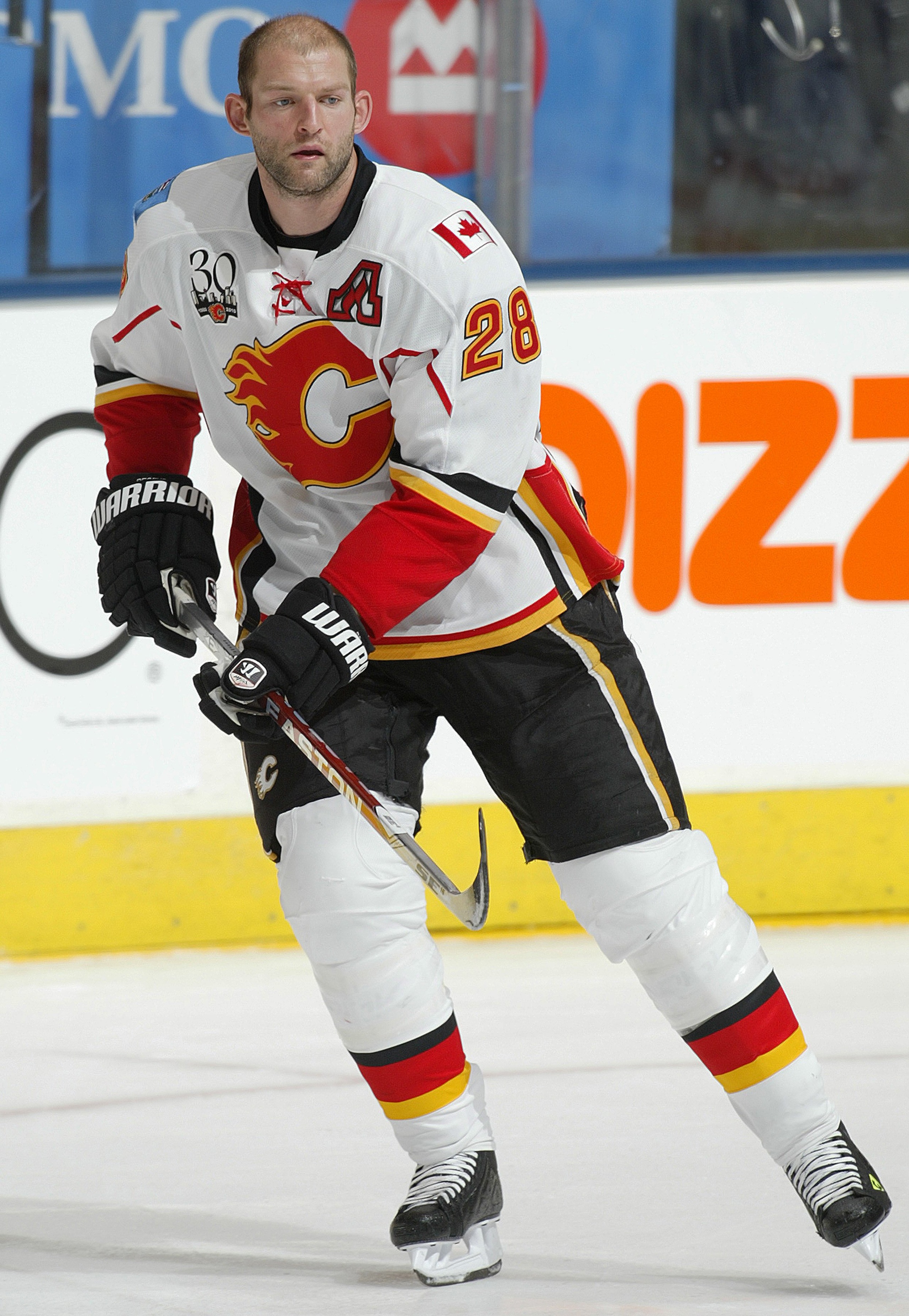 TORONTO, ON - NOVEMBER 14: Robyn Regher #28 of the Calgary Flames skates in the pre game warm-up prior to a game against the Toronto Maple Leafs on November 14,2009 at the Air Canada Centre in Toronto, Ontario. The Flames won 5-2. (Photo by Claus Anderse TORONTO, ON - NOVEMBER 14: Robyn Regher #28 of the Calgary Flames skates in the pre game warm-up prior to a game against the Toronto Maple Leafs on November 14,2009 at the Air Canada Centre in Toronto, Ontario. The Flames won 5-2. (Photo by Claus Anderse