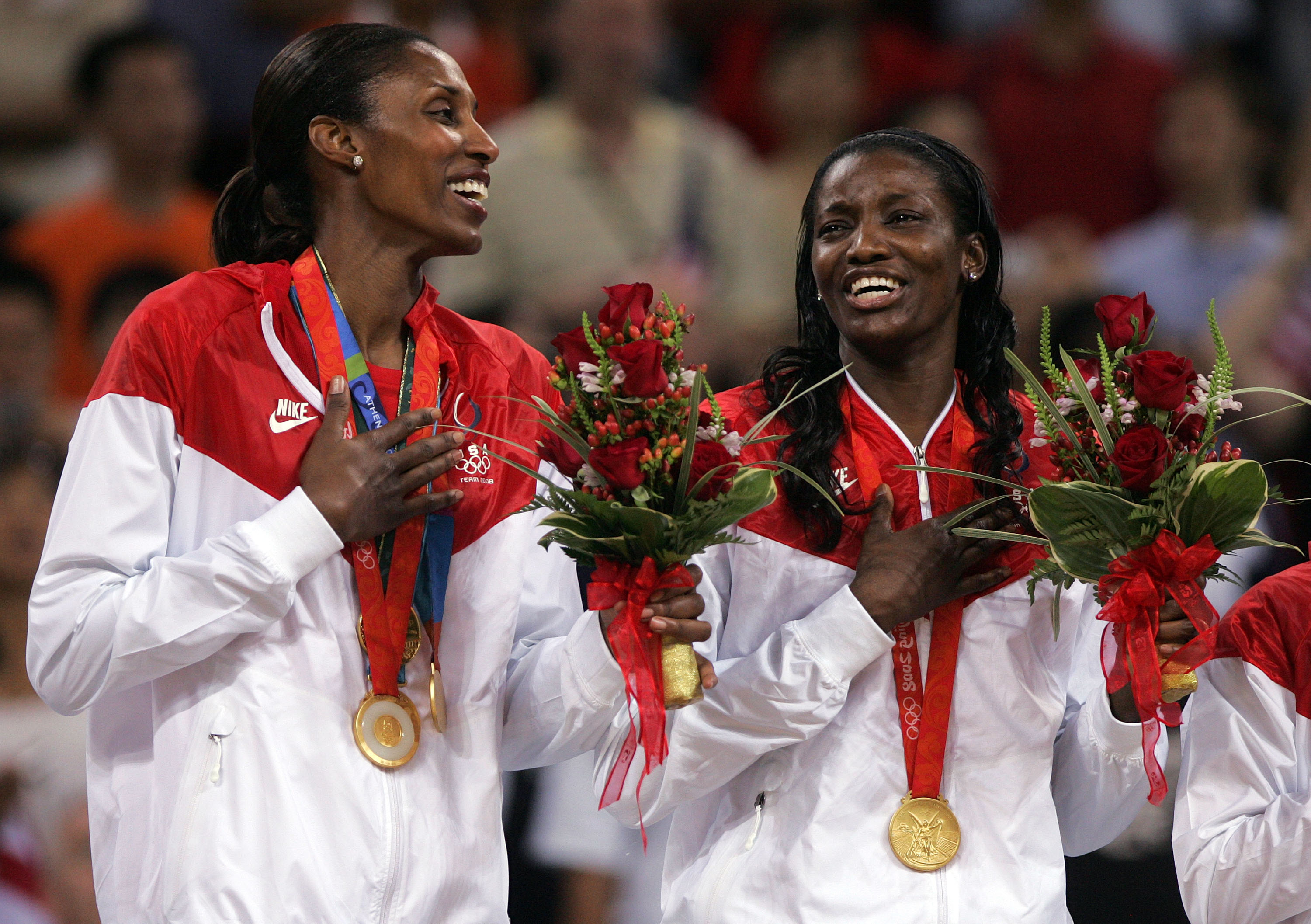 BEIJING - AUGUST 23: Lisa Leslie and Delisha Milton-Jones celebrate after winning the gold medal against Australia at the Beijing Olympic Basketball Gymnasium on Day 15 of the Beijing 2008 Olympic Games on August 23, 2008 in Beijing, China. (Photo by Je