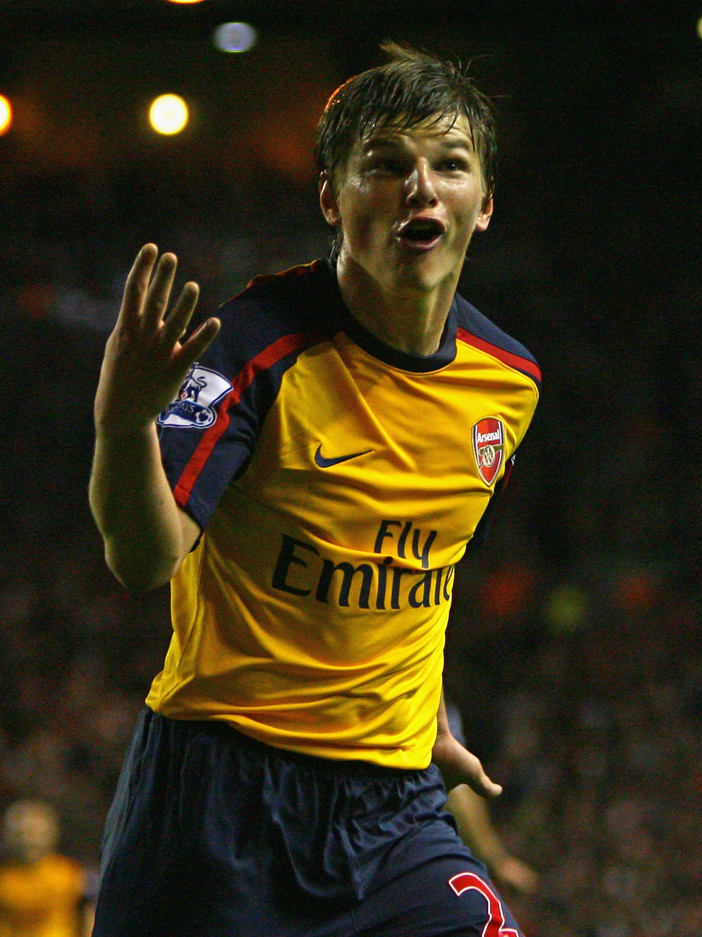 LIVERPOOL, UNITED KINGDOM - APRIL 21:  Andrey Arshavin of Arsenal  celebrates scoring his team's and his fourth goal during the Barclays Premier League match between Liverpool and Arsenal at Anfield on April 21, 2009 in Liverpool, England.  (Photo by Alex