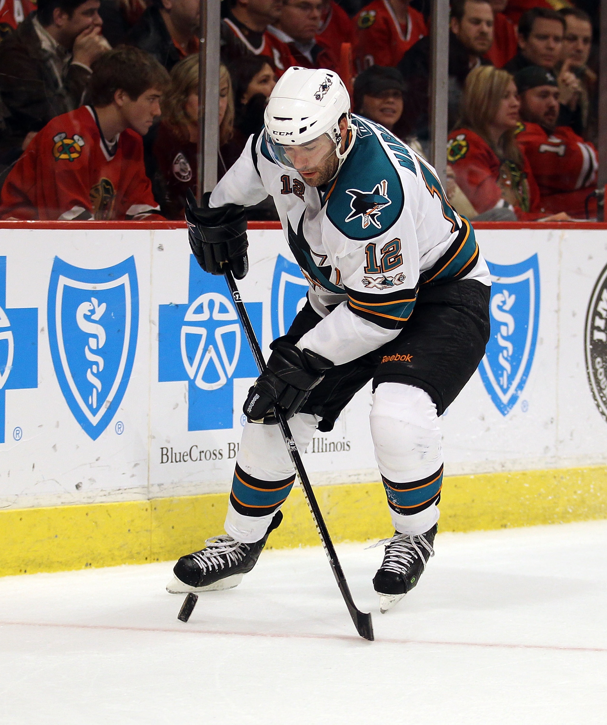 CHICAGO, IL - DECEMBER 30: Patrick Marleau #12 of the San Jose Sharks controls the puck against the Chicago Blackhawks at the United Center on December 30, 2010 in Chicago, Illinois. The Sharks defeated the Blackhawks 5-3. (Photo by Jonathan Daniel/Getty