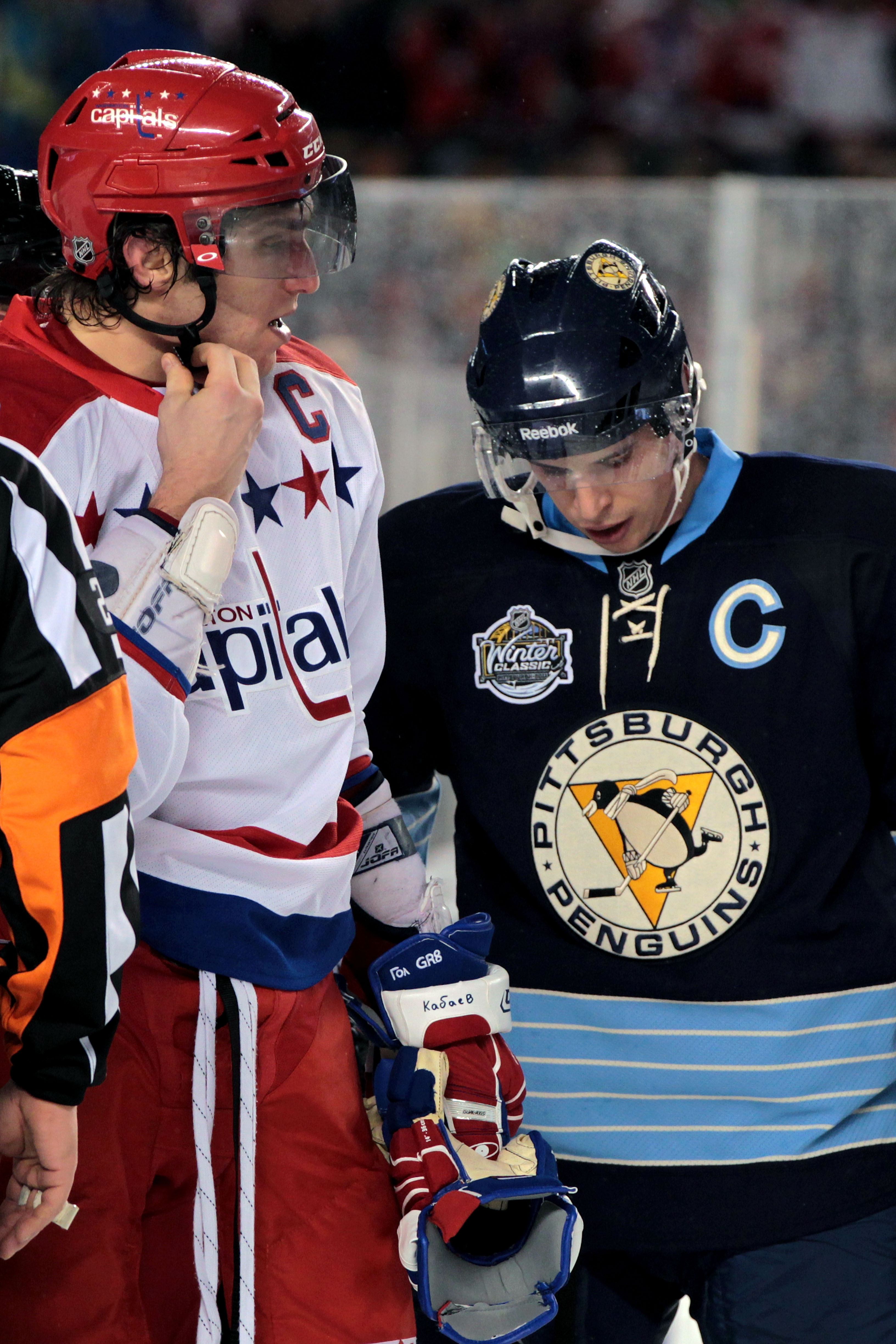 PITTSBURGH, PA - JANUARY 01:  Alex Ovechkin #8 of the Washington Capitals and Sidney Crosby #81 of the Pittsburgh Penguins are seen during the 2011 NHL Bridgestone Winter Classic at Heinz Field on January 1, 2011 in Pittsburgh, Pennsylvania. Washington wo