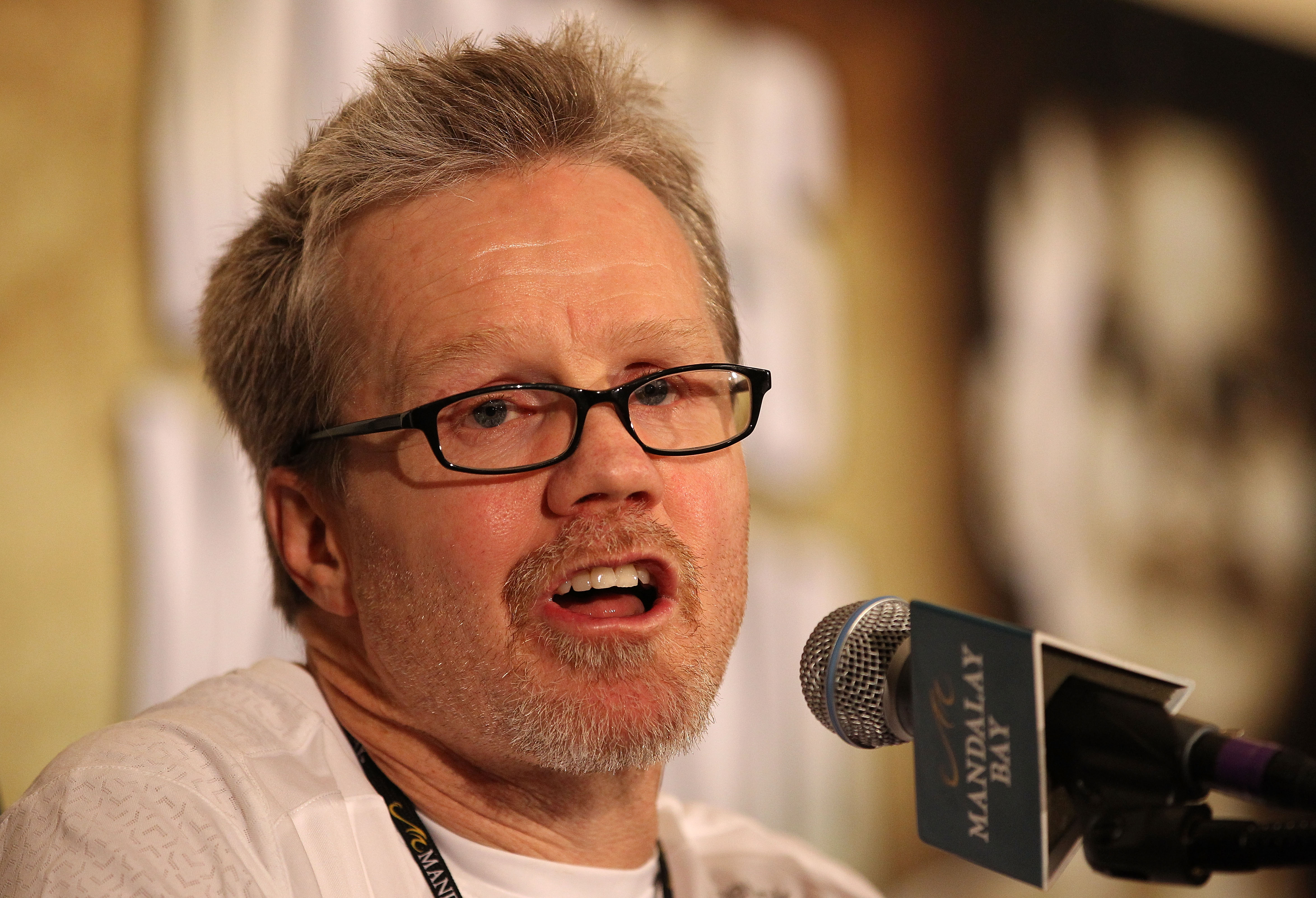 LAS VEGAS - DECEMBER 11:  Trainer Freddie Roach, who trains Amir Khan of England, answers questions during the post-fight news conference after Khan's unanimous decision victory against Marcos Maidana of Argentina after their WBA super lightweight title f
