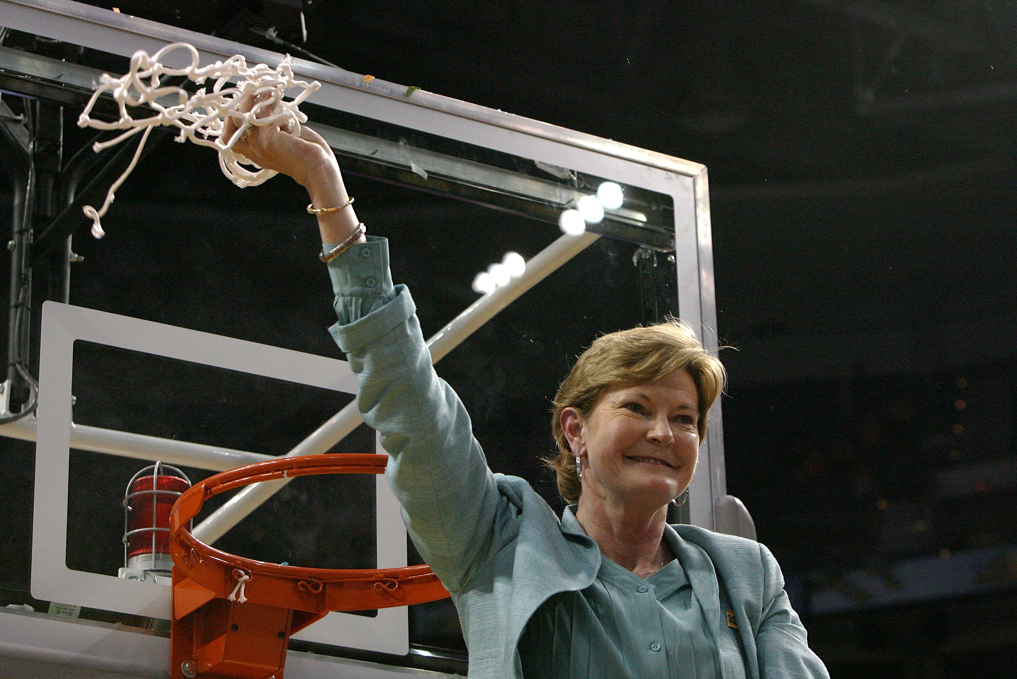 TAMPA, FL - APRIL 08:  Head coach Pat Summitt of the Tennessee Lady Volunteers celebrates cutting down the net after their 64-48 win against the Stanford Cardinal during the National Championsip Game of the 2008 NCAA Women's Final Four at St. Pete Times F