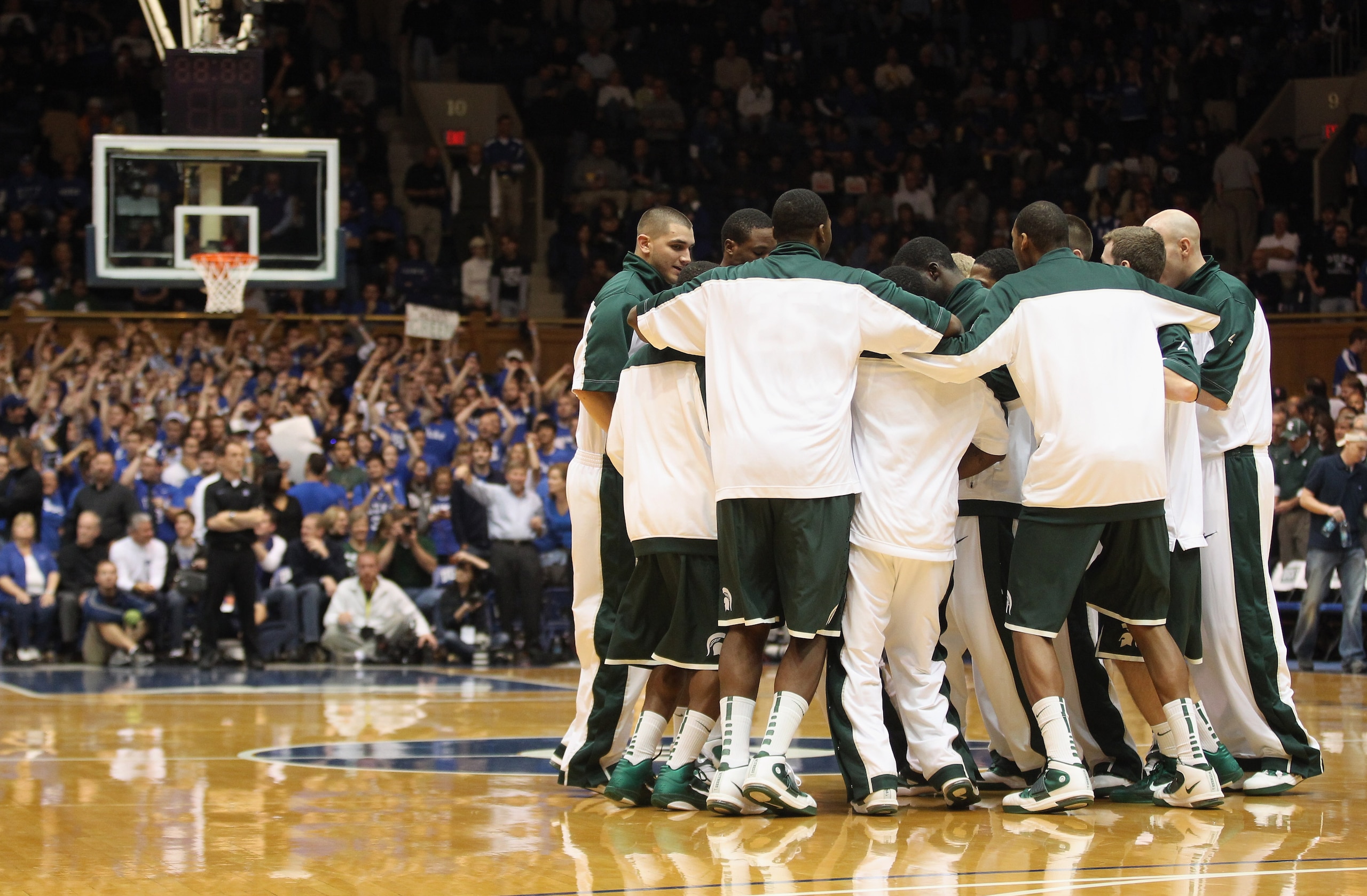 DURHAM, NC - DECEMBER 01:  The Michigan State Spartans huddle before their game against the Duke Blue Devils at Cameron Indoor Stadium on December 1, 2010 in Durham, North Carolina.  (Photo by Streeter Lecka/Getty Images)