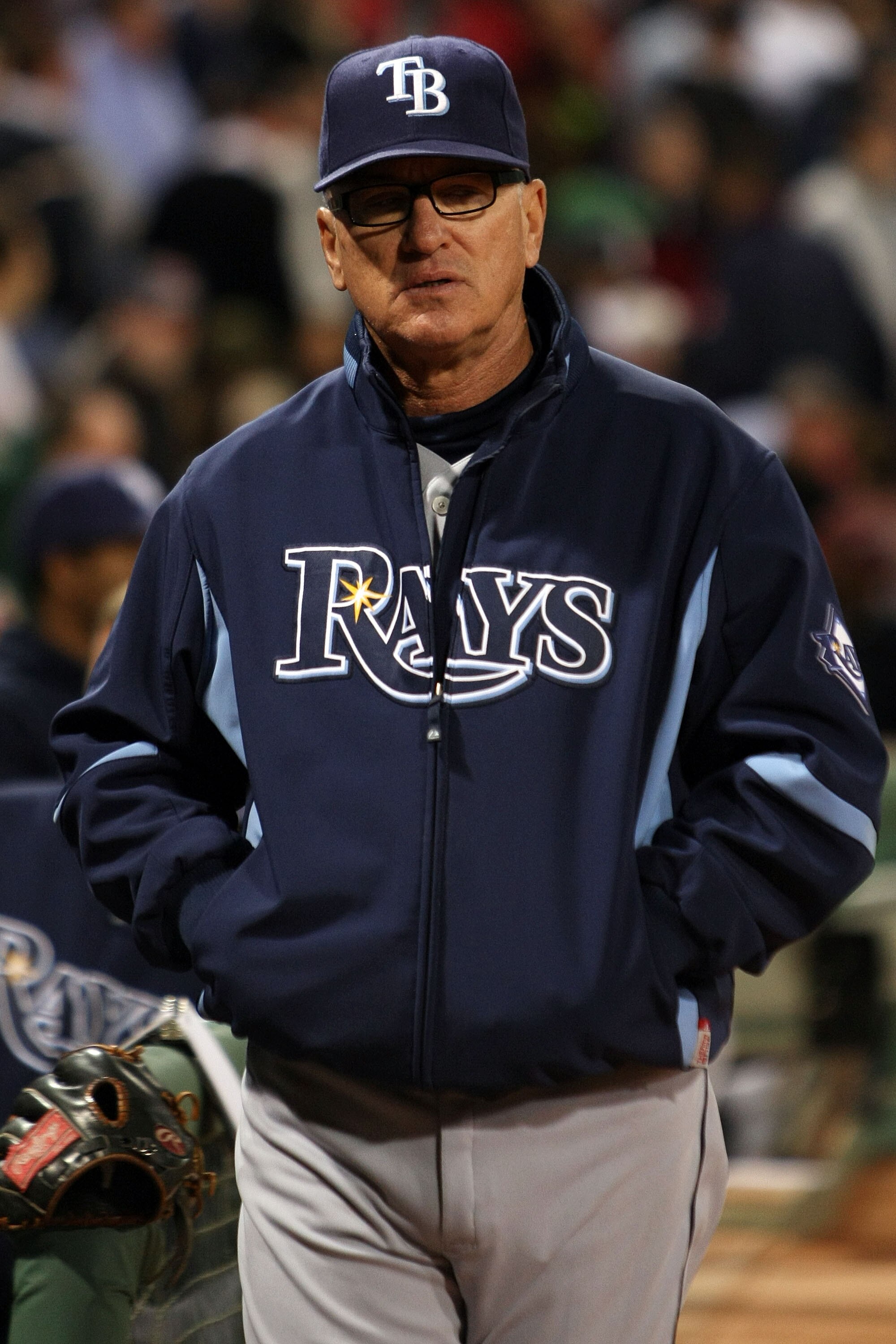 BOSTON - OCTOBER 14:  Manager Joe Madden of the Tampa Bay Rays looks on as his team takes on the Boston Red Sox in game four of the American League Championship Series during the 2008 MLB playoffs at Fenway Park on October 14, 2008 in Boston, Massachusett
