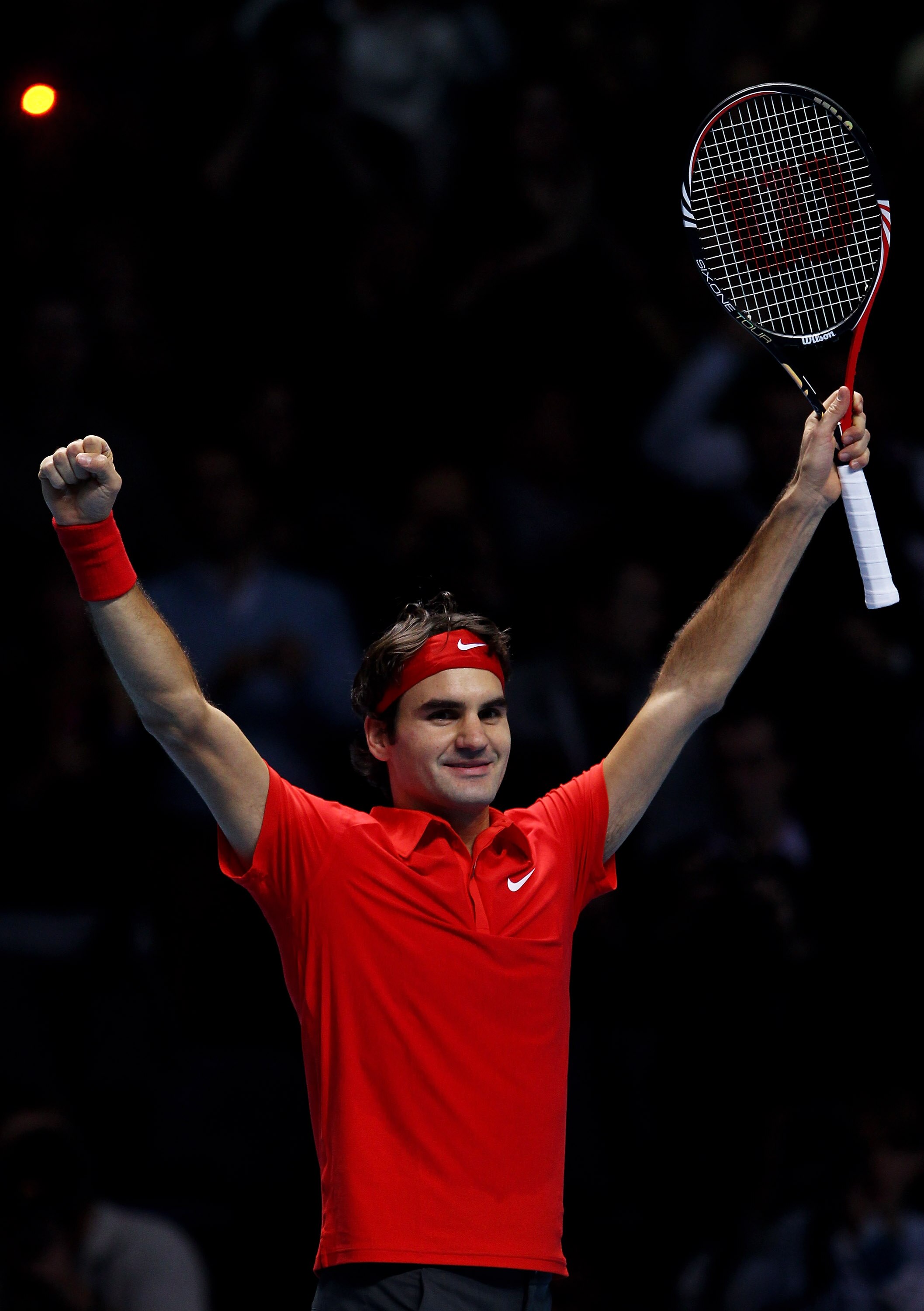 LONDON, ENGLAND - NOVEMBER 28:  Roger Federer of Switzerland celebrates victory during his men's final match against Rafael Nadal of Spain during the ATP World Tour Finals at O2 Arena on November 28, 2010 in London, England.  (Photo by Julian Finney/Getty