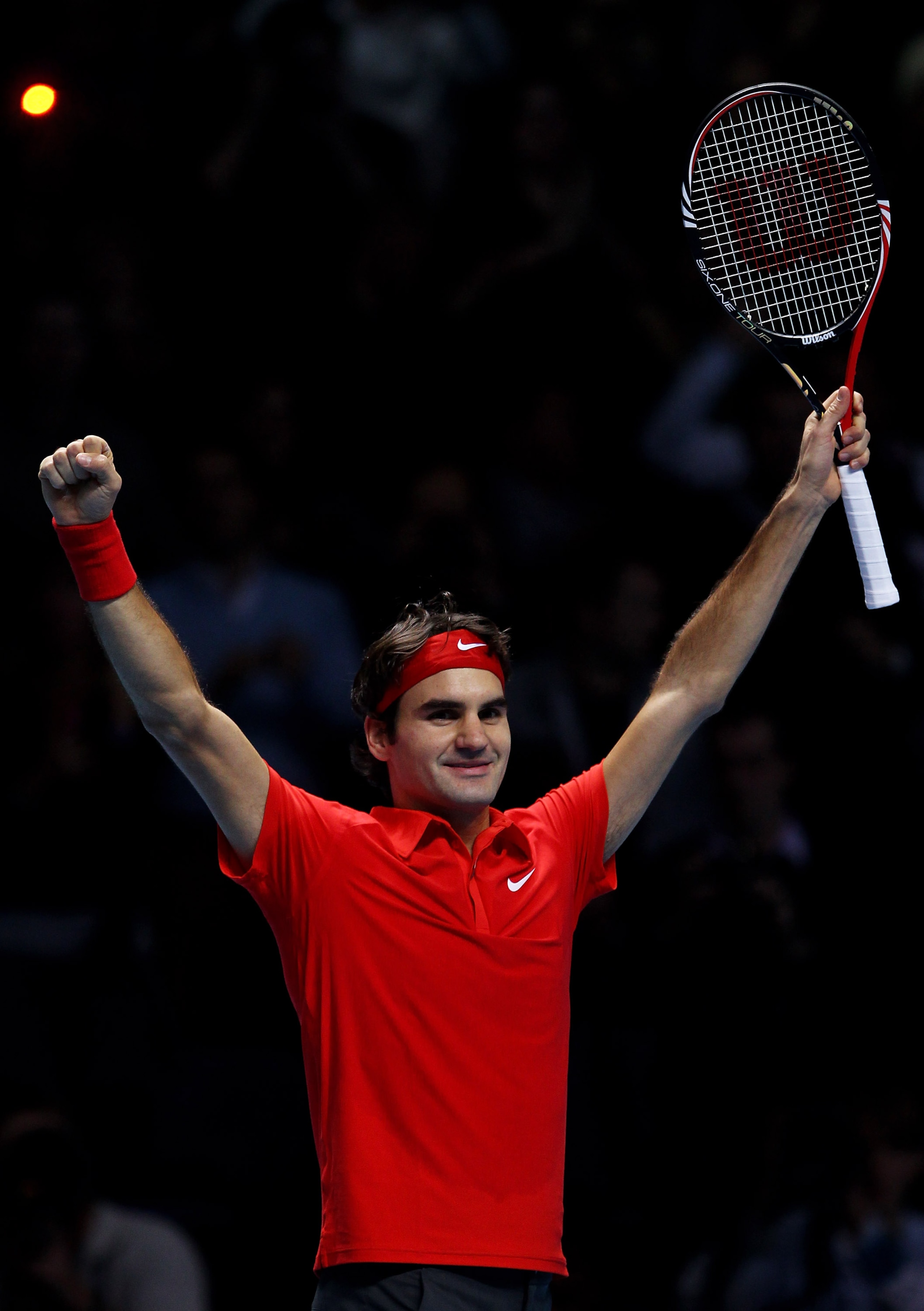 LONDON, ENGLAND - NOVEMBER 28:  Roger Federer of Switzerland celebrates victory during his men's final match against Rafael Nadal of Spain during the ATP World Tour Finals at O2 Arena on November 28, 2010 in London, England.  (Photo by Julian Finney/Getty