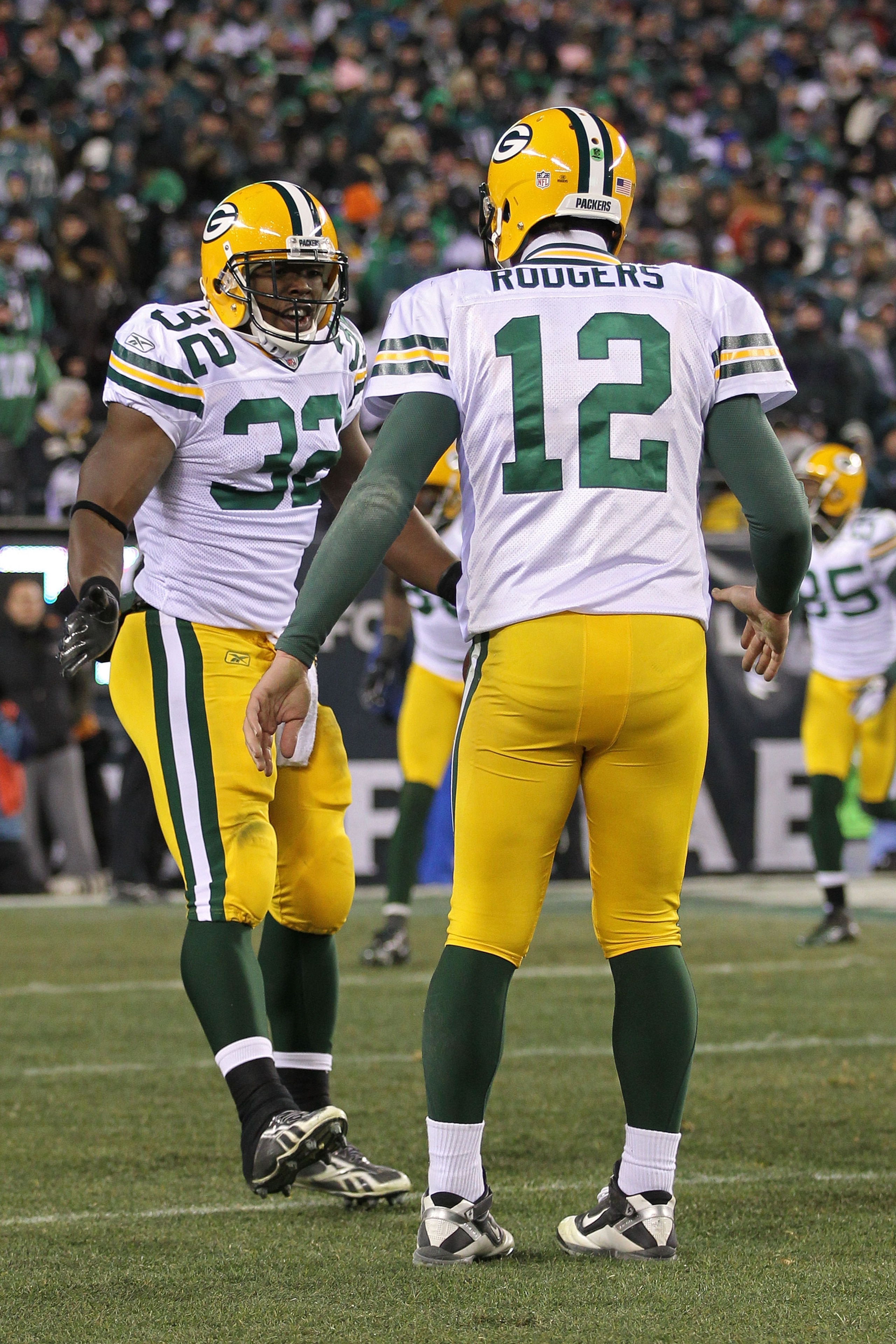 PHILADELPHIA, PA - JANUARY 09: Aaron Rodgers #12 of the Green Bay Packers and Brandon Jackson #32 celebrate after a touchdown in the third quarter against the Philadelphia Eagles during the 2011 NFC wild card playoff game at Lincoln Financial Field on Ja PHILADELPHIA, PA - JANUARY 09: Aaron Rodgers #12 of the Green Bay Packers and Brandon Jackson #32 celebrate after a touchdown in the third quarter against the Philadelphia Eagles during the 2011 NFC wild card playoff game at Lincoln Financial Field on Ja