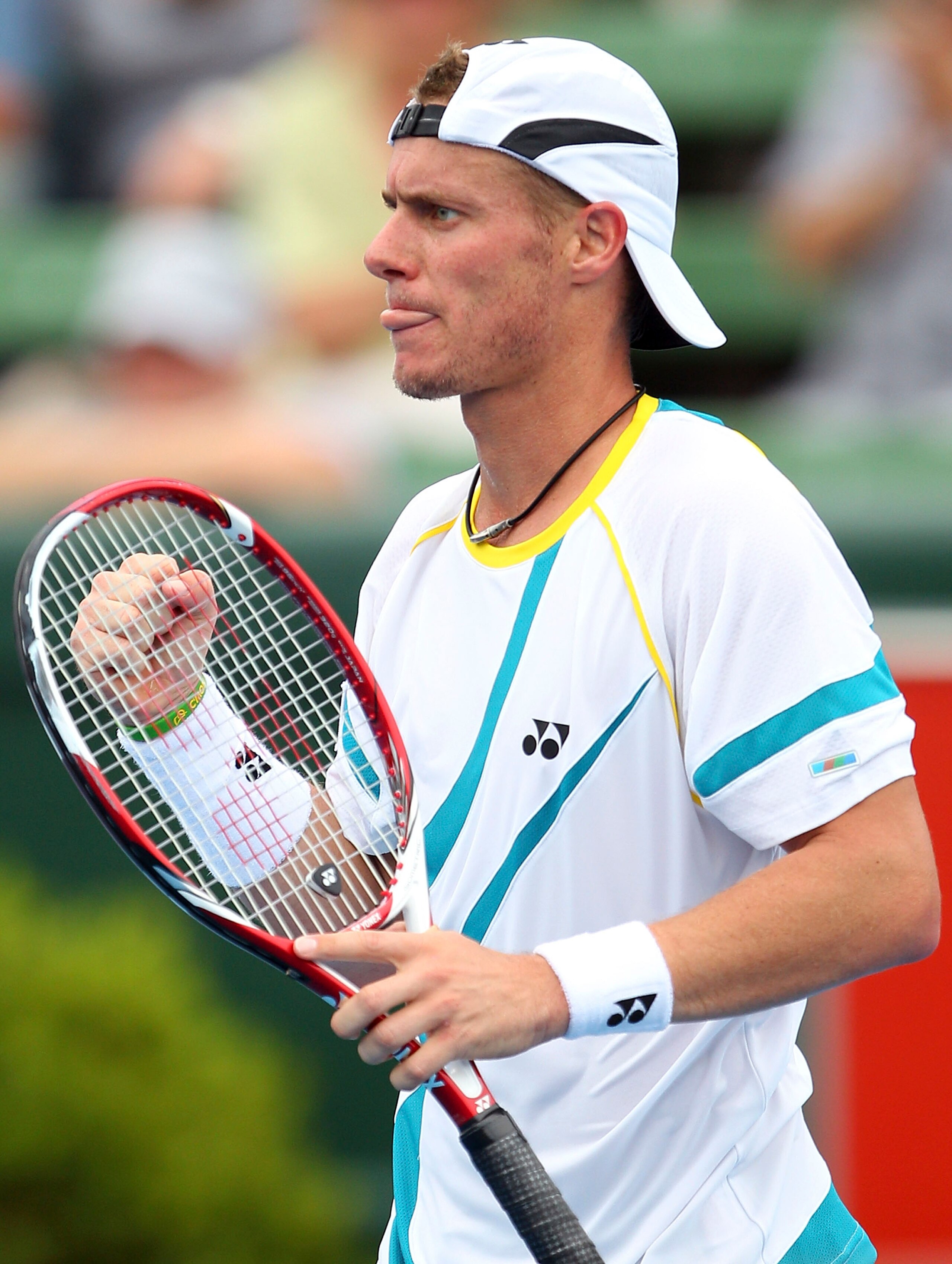 MELBOURNE, AUSTRALIA - JANUARY 12:  Lleyton Hewitt of Australia celebrates winning his match against Mikhail Youzhny of Russia during day one of the AAMI Classic at Kooyong on January 12, 2011 in Melbourne, Australia.  (Photo by Lucas Dawson/Getty Images)