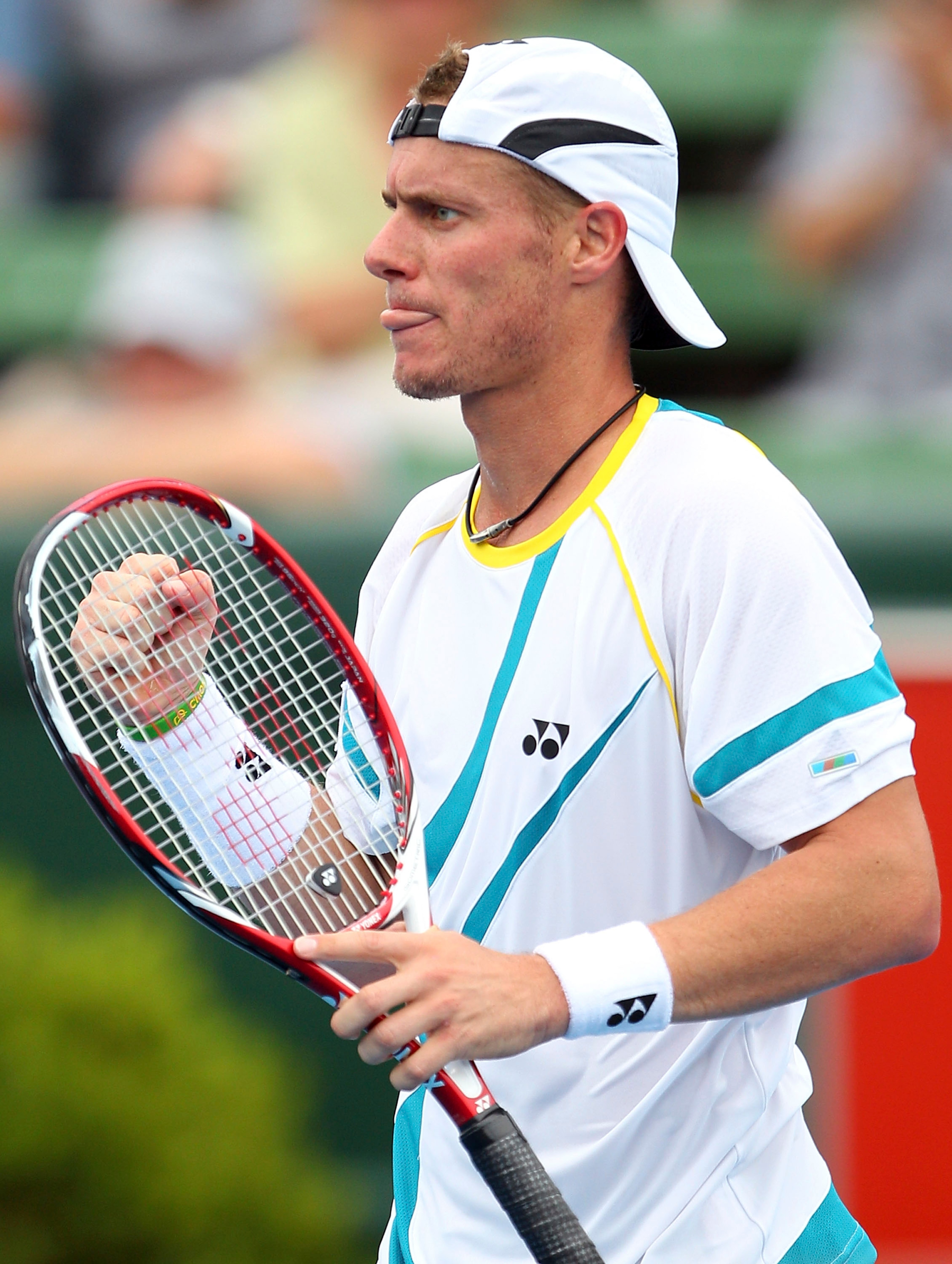MELBOURNE, AUSTRALIA - JANUARY 12:  Lleyton Hewitt of Australia celebrates winning his match against Mikhail Youzhny of Russia during day one of the AAMI Classic at Kooyong on January 12, 2011 in Melbourne, Australia.  (Photo by Lucas Dawson/Getty Images)