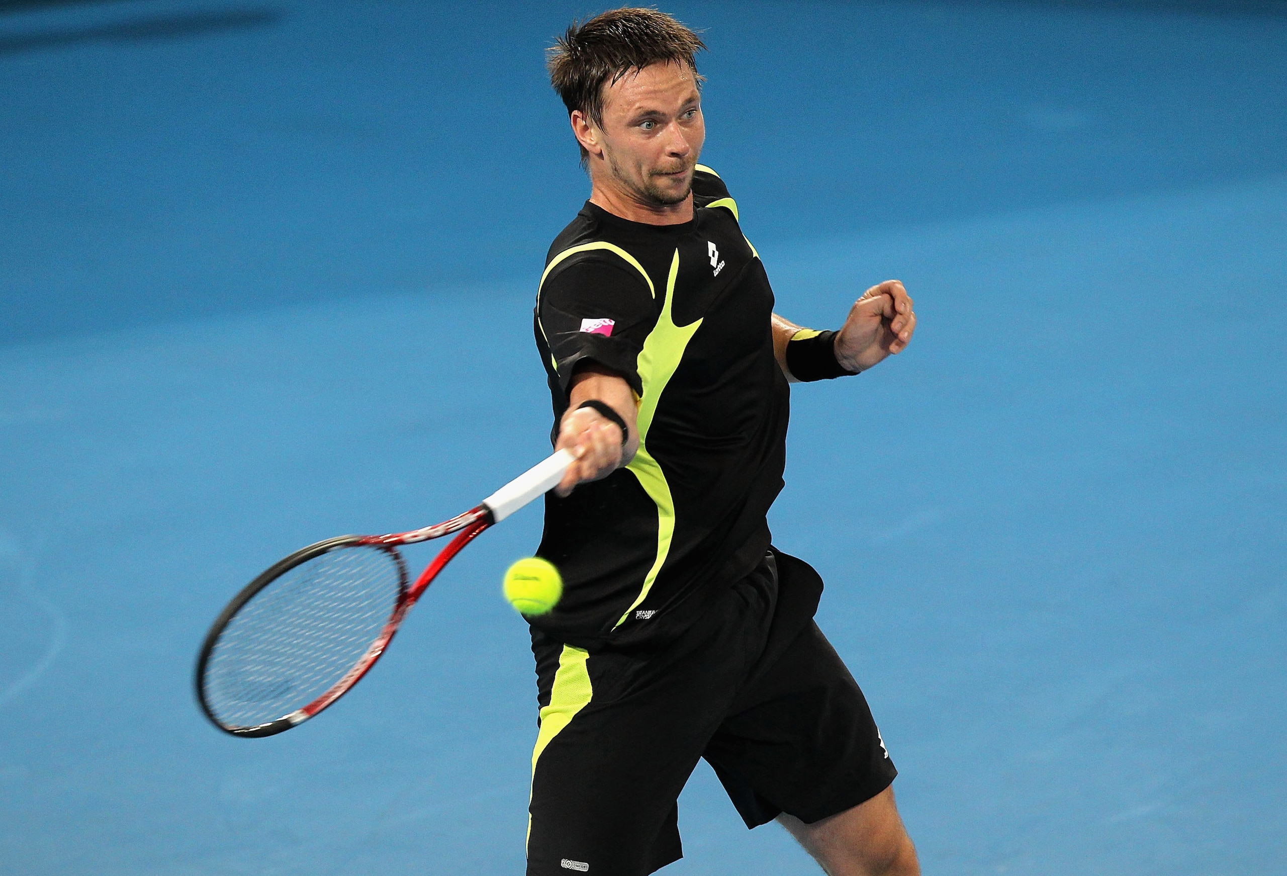 BRISBANE, AUSTRALIA - JANUARY 09:  Robin Soderling of Sweden plays a forehand during his finals match against Andy Roddick of the USA during day eight of the Brisbane International at Queensland Tennis Centre on January 9, 2011 in Brisbane, Australia.  (P