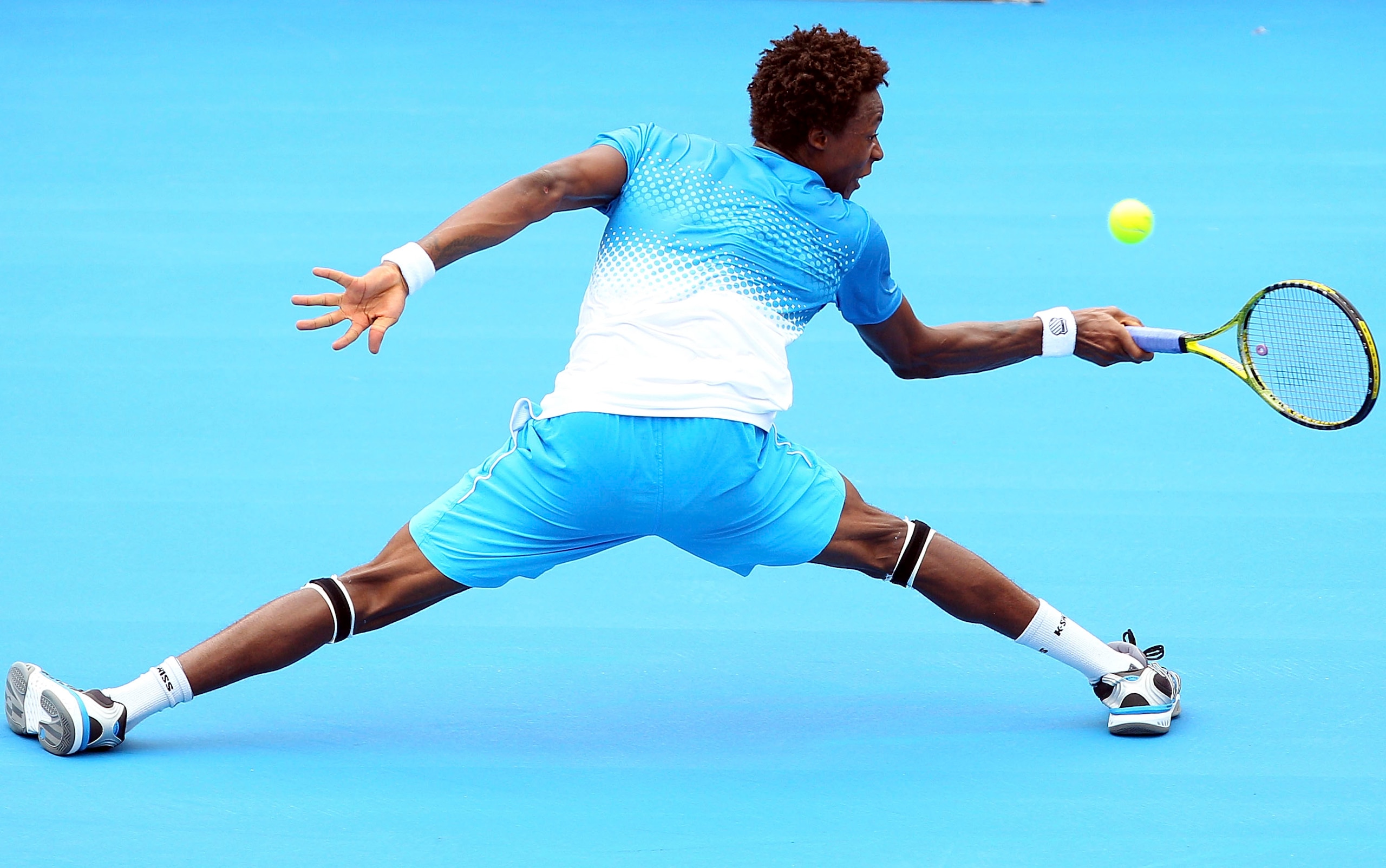 MELBOURNE, AUSTRALIA - JANUARY 12: Gael Monfils of France plays a backhand during his match against Fernando Verdasco of Spain during day one of the AAMI Classic at Kooyong on January 12, 2011 in Melbourne, Australia. (Photo by Lucas Dawson/Getty Images)