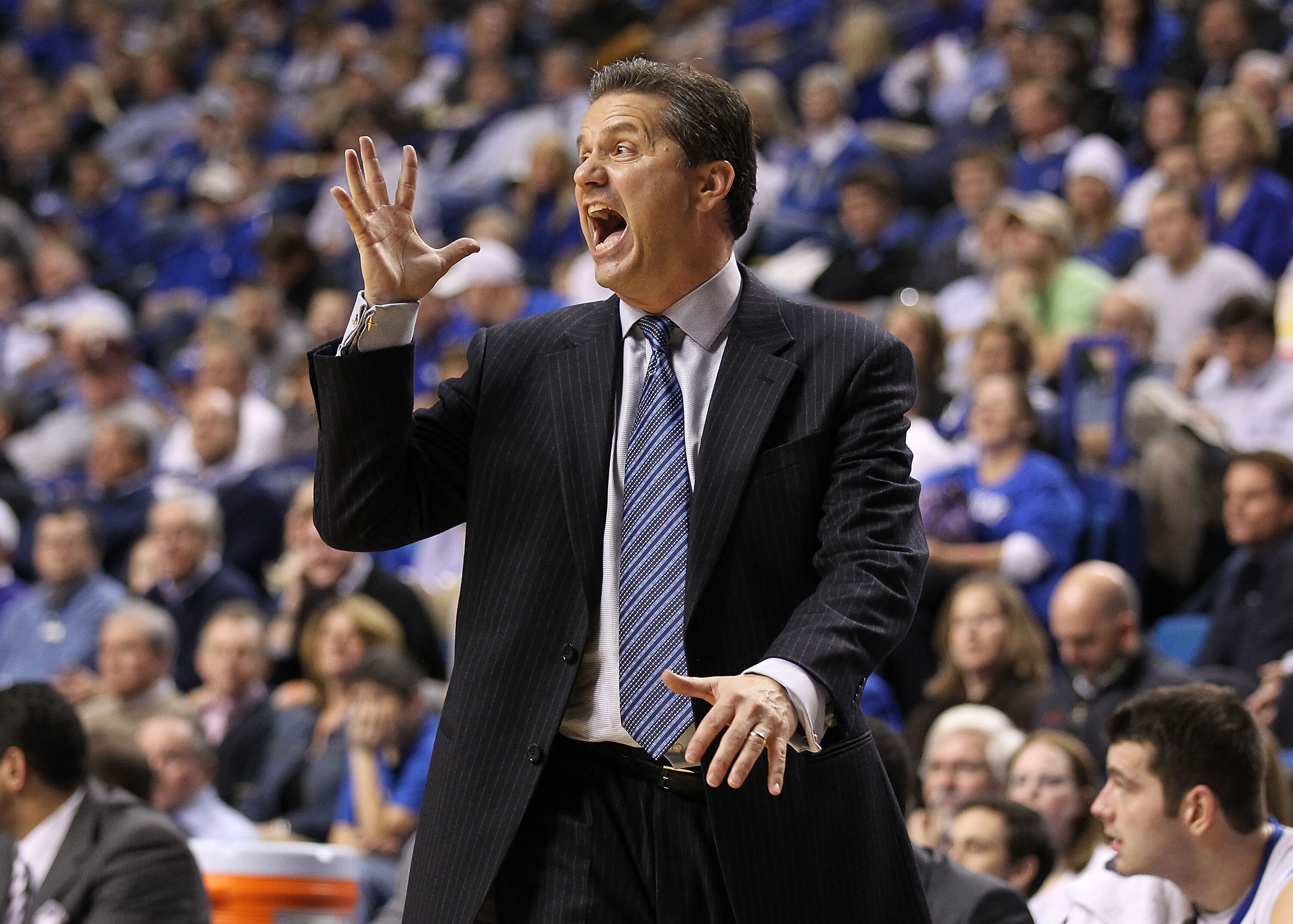 LEXINGTON, KY - JANUARY 03:  John Calipari the Head Coach of the Kentucky Wildcats gives instructions to his team during the game against the Penn Quakers at Rupp Arena on January 3, 2011 in Lexington, Kentucky.  Kentucky won 86-62.  (Photo by Andy Lyons/