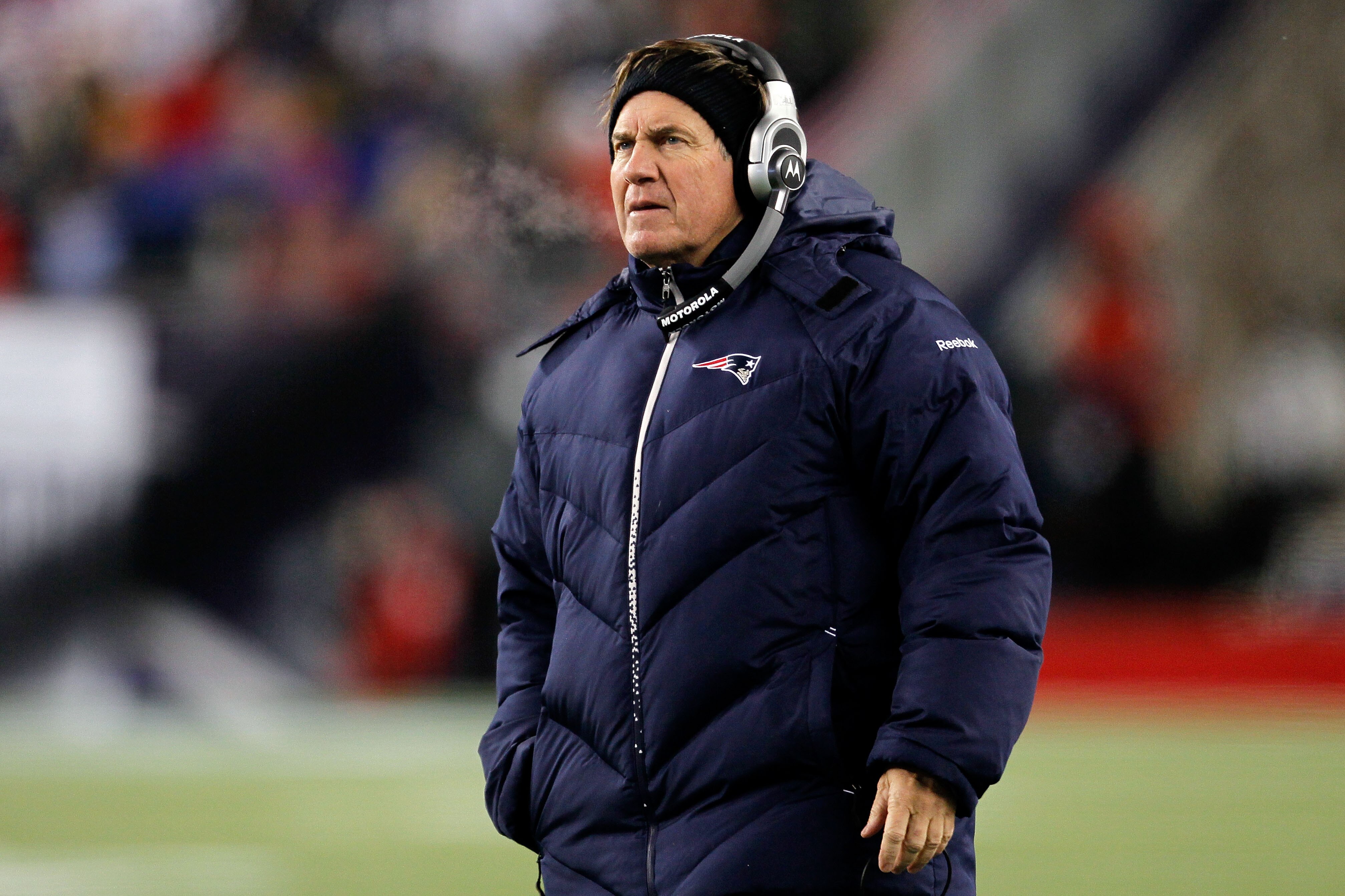 FOXBORO, MA - DECEMBER 06:  Head coach Bill Belichick of the New England Patriots looks on in the first half against the New York Jets at Gillette Stadium on December 6, 2010 in Foxboro, Massachusetts.  (Photo by Jim Rogash/Getty Images)
