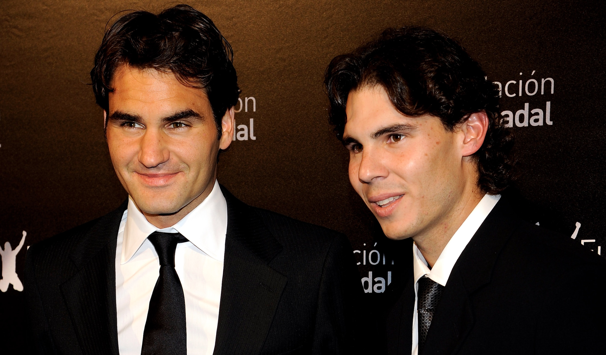 MADRID, SPAIN - DECEMBER 22:  Roger Federer (L) and Rafael Nadal (R) attend 'Rafa Nadal Foundation' Charity Gala at Cibeles Palace on December 22, 2010 in Madrid, Spain.  (Photo by Carlos Alvarez/Getty Images)