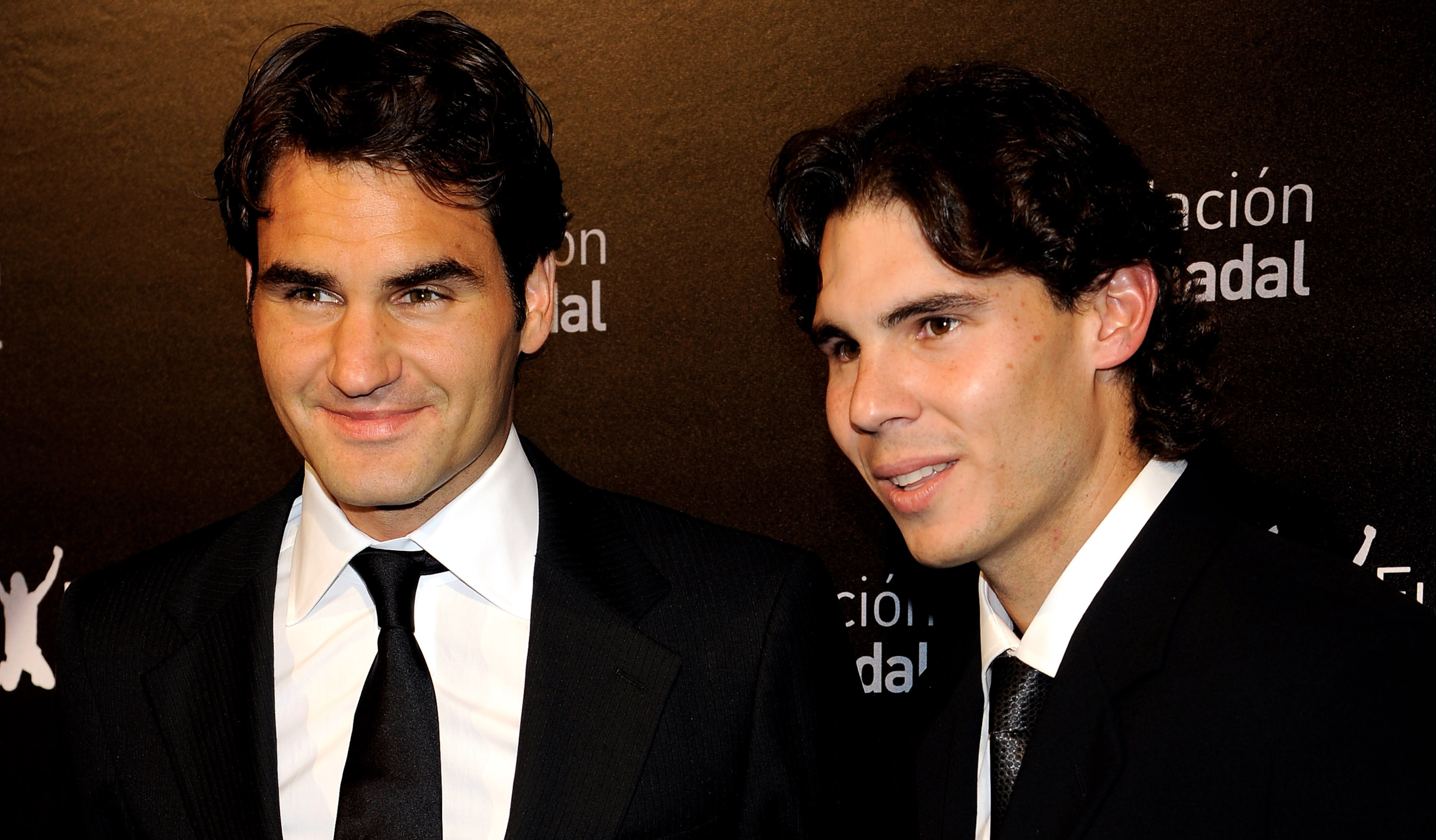 MADRID, SPAIN - DECEMBER 22:  Roger Federer (L) and Rafael Nadal (R) attend 'Rafa Nadal Foundation' Charity Gala at Cibeles Palace on December 22, 2010 in Madrid, Spain.  (Photo by Carlos Alvarez/Getty Images)