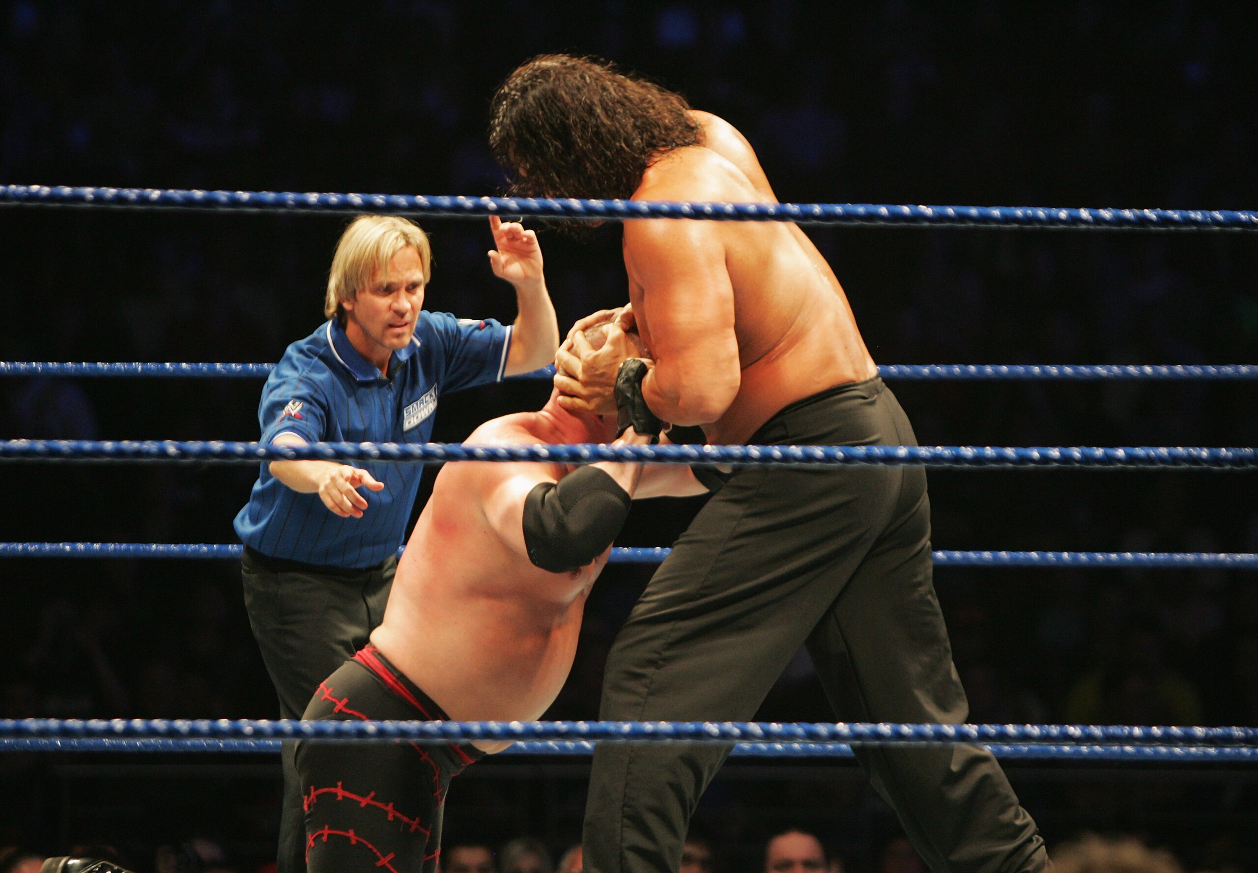 SYDNEY, AUSTRALIA - JUNE 15:  The Great Khali puts ECW Champion Kane into a vice grip during WWE Smackdown at Acer Arena on June 15, 2008 in Sydney, Australia.  (Photo by Gaye Gerard/Getty Images)