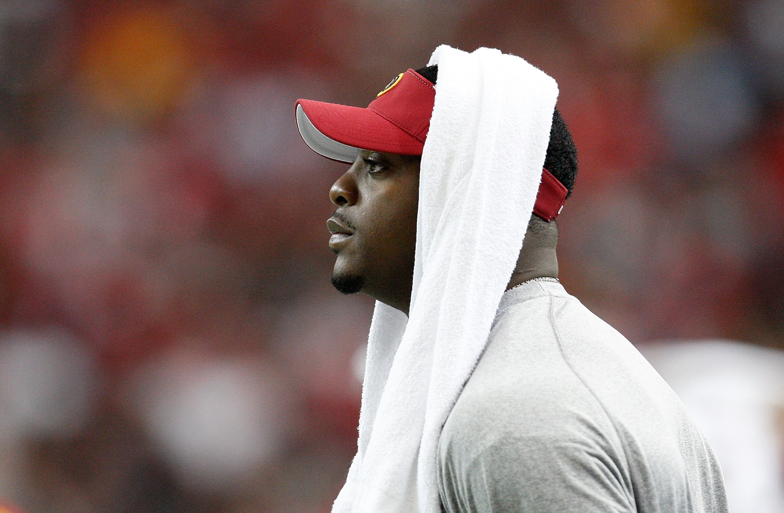 ATLANTA - NOVEMBER 08:  Clinton Portis #26 of the Washington Redskins watches from the sidelines after suffering a concussion against the Atlanta Falcons at Georgia Dome on November 8, 2009 in Atlanta, Georgia.  (Photo by Kevin C. Cox/Getty Images)