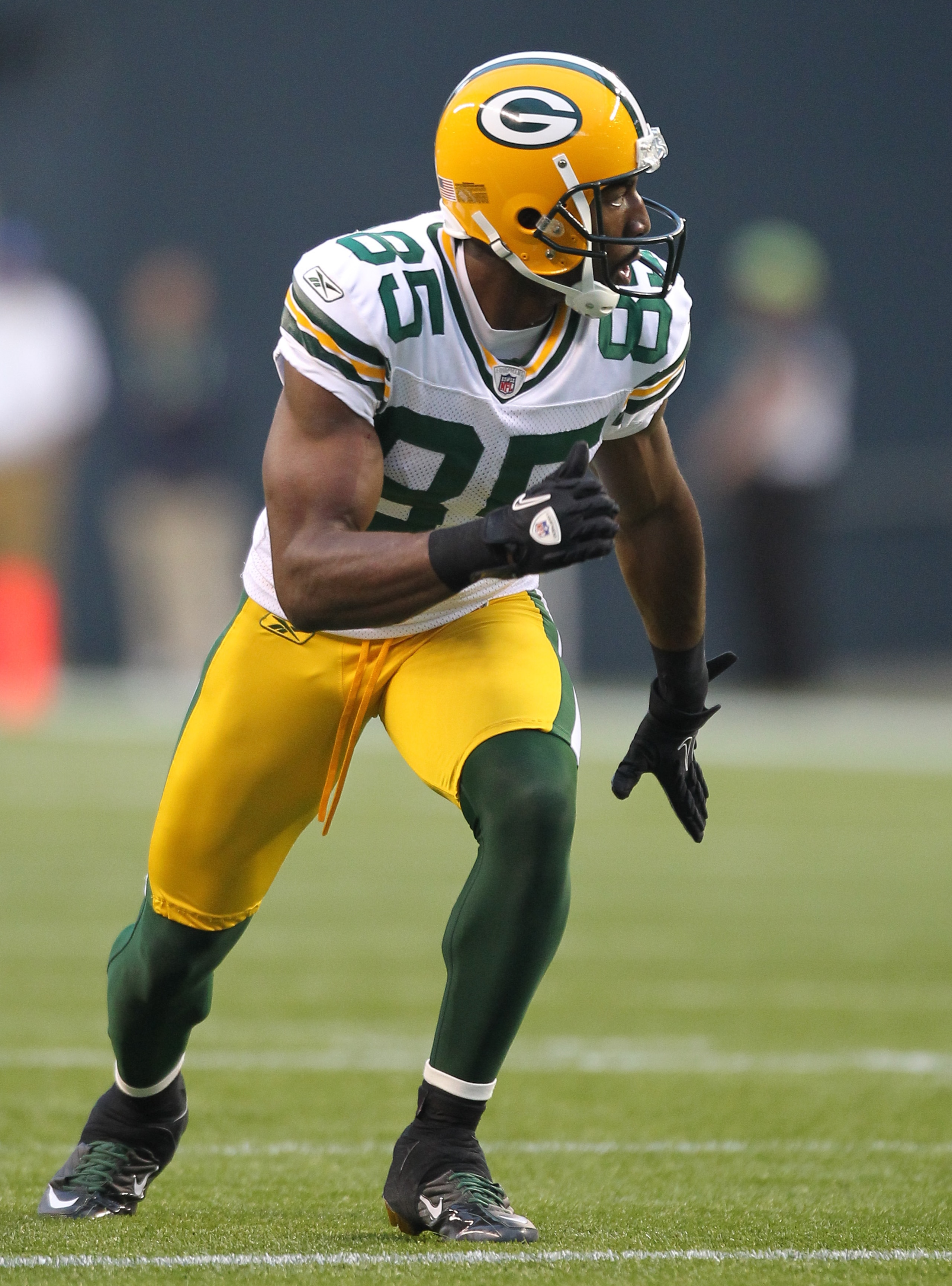 SEATTLE - AUGUST 21:  Wide receiver Greg Jennings #85 of the Green Bay Packers runs a pass route during the preseason game against the Seattle Seahawks at Qwest Field on August 21, 2010 in Seattle, Washington. (Photo by Otto Greule Jr/Getty Images)