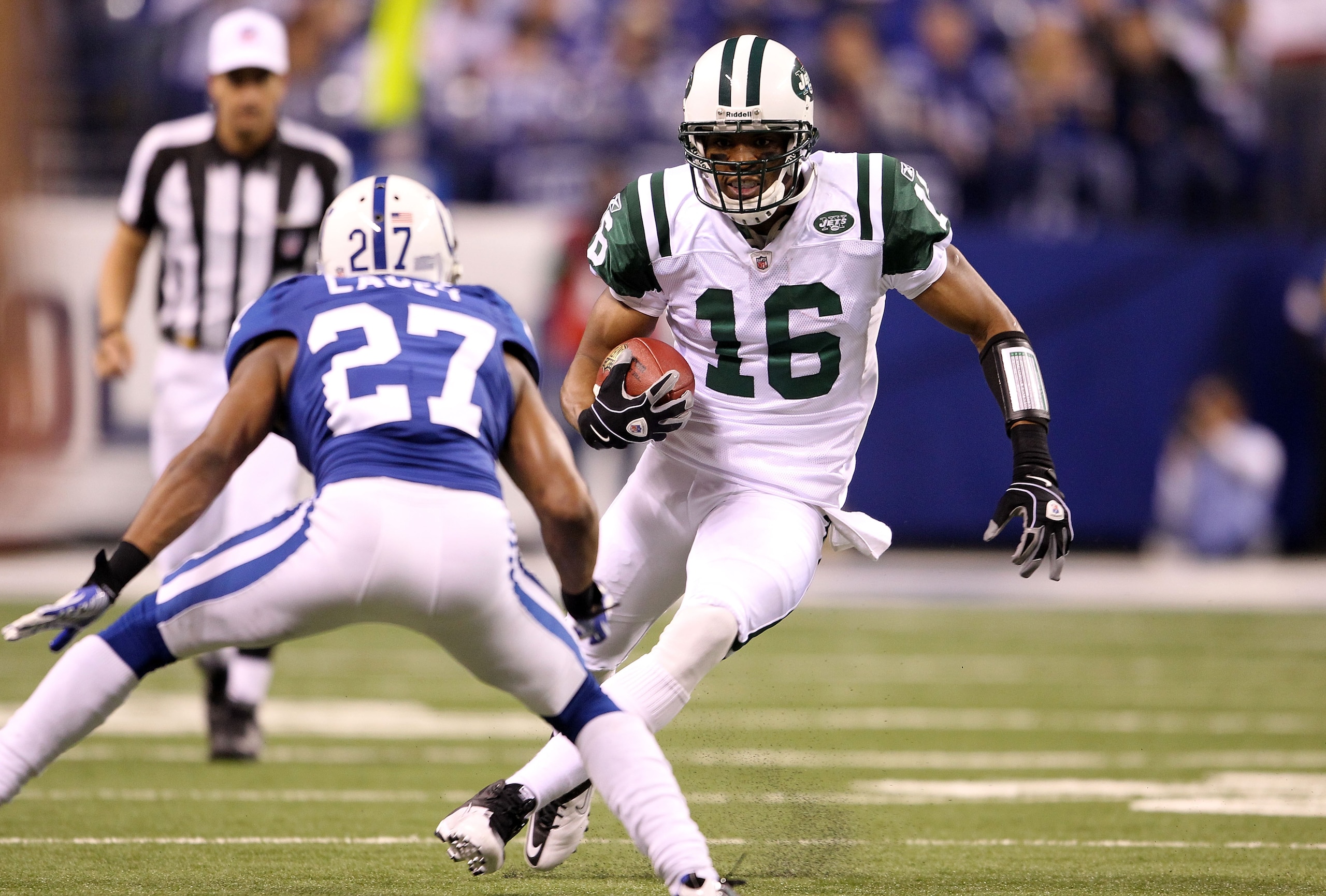INDIANAPOLIS, IN - JANUARY 08:  Brad Smith #16 of the New York Jets runs with the ball against the Indianapolis Colts during their 2011 AFC wild card playoff game at Lucas Oil Stadium on January 8, 2011 in Indianapolis, Indiana. The Jets won 17-16.  (Phot