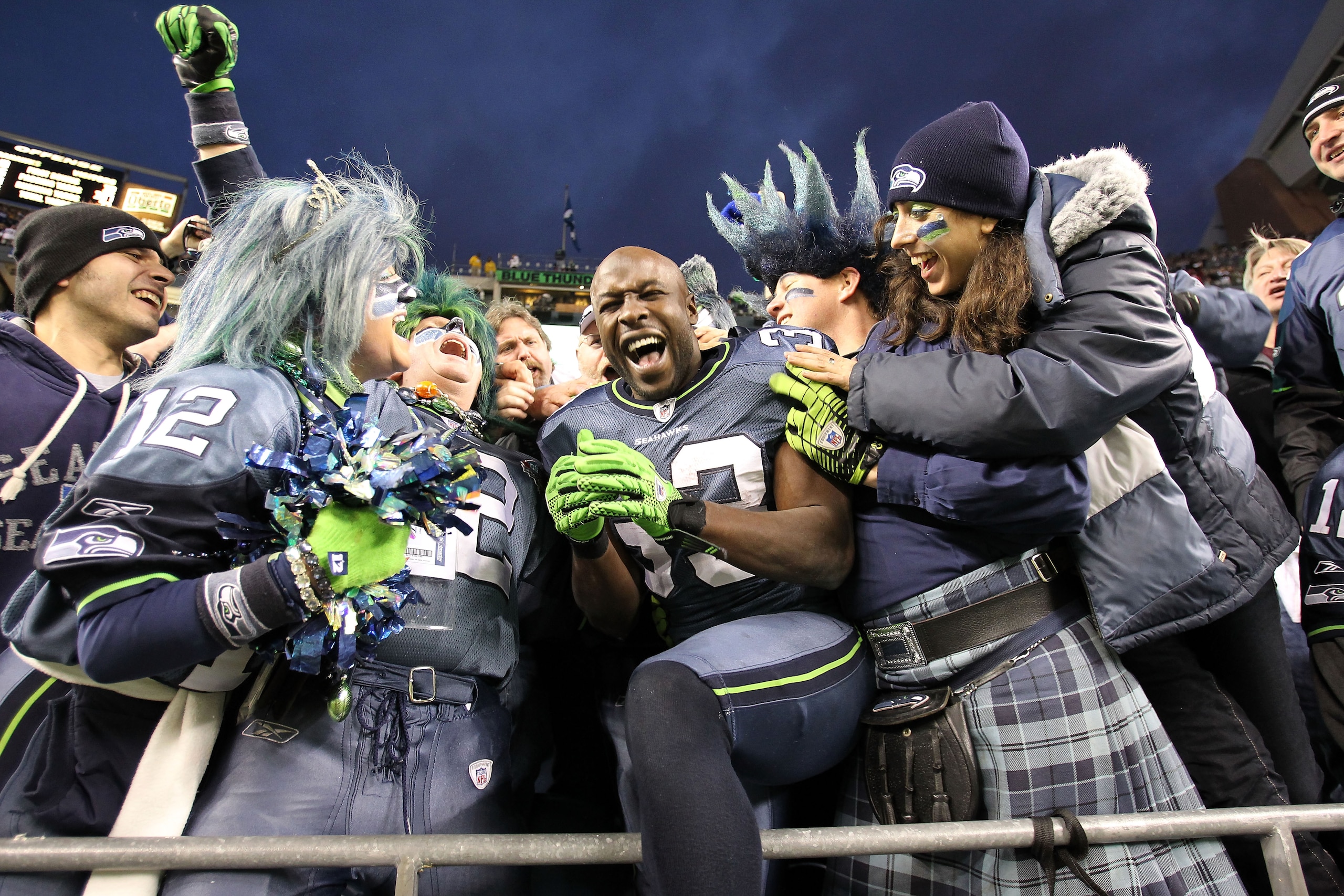 SEATTLE, WA - JANUARY 08:  Leon Washington #33 of the Seattle Seahawks celebrates the Seahawks 41-36 victory against the New Orleans Saints during the 2011 NFC wild-card playoff game at Qwest Field on January 8, 2011 in Seattle, Washington.  (Photo by Jon